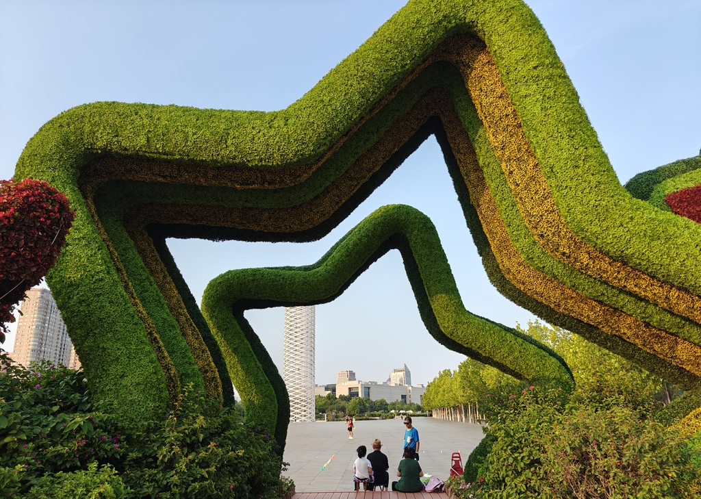 A vibrant cityscape is seen in Tianjin on July 18, 2025. /IC