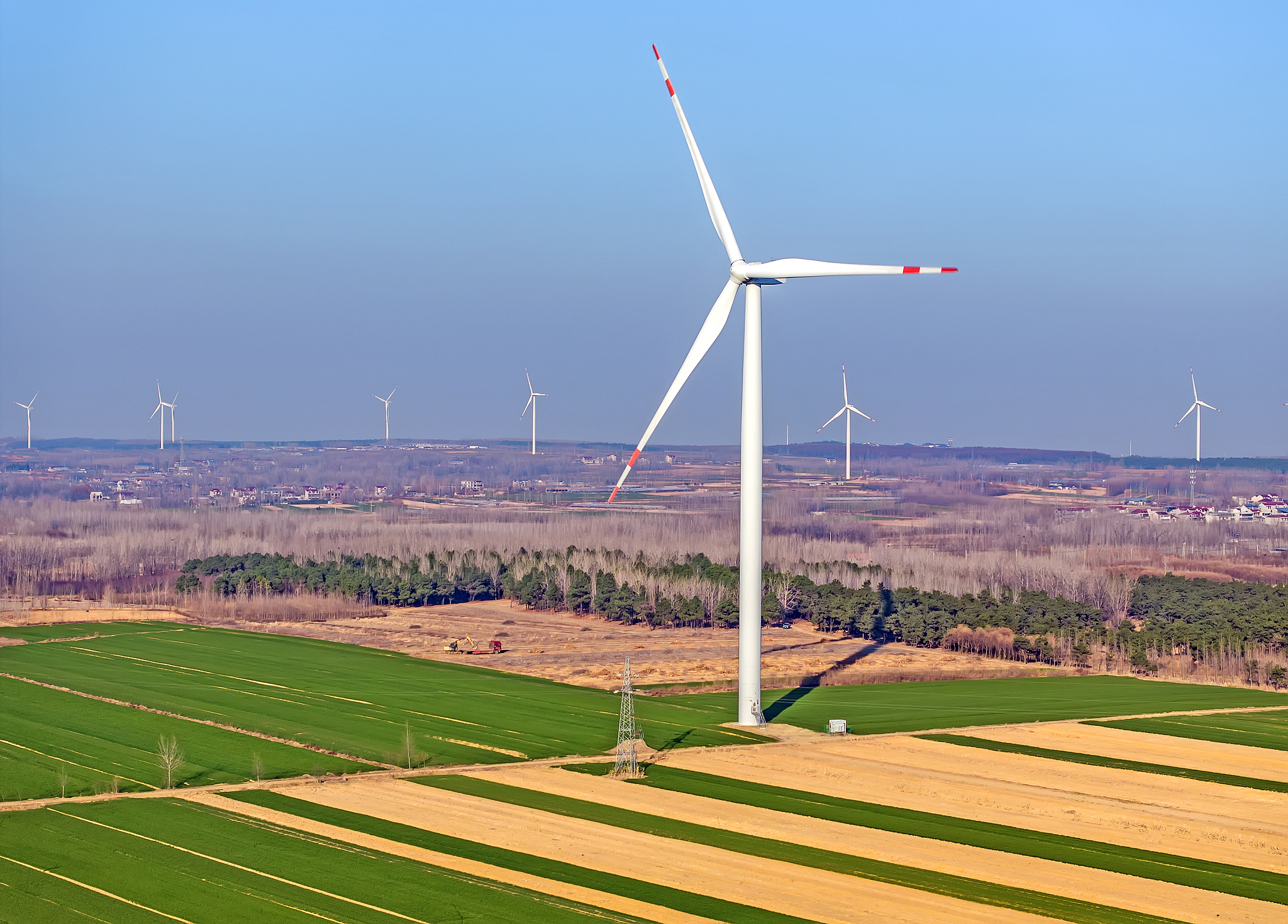 Rows of wind turbines stand on hills in Lianyungang City, Jiangsu Province, China, December 15, 2024. /VCG