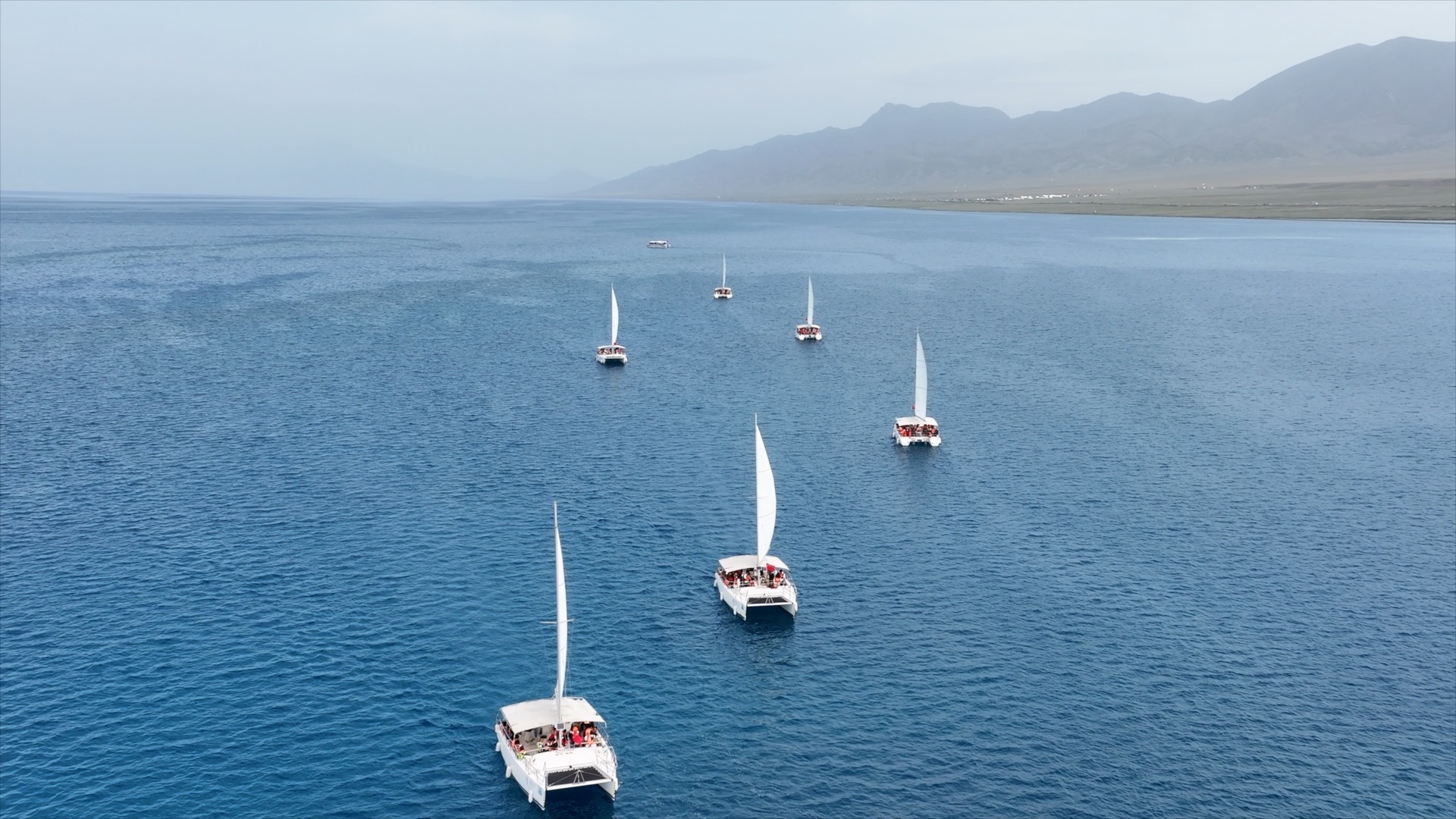 Sailing on wind-powered catamarans. 