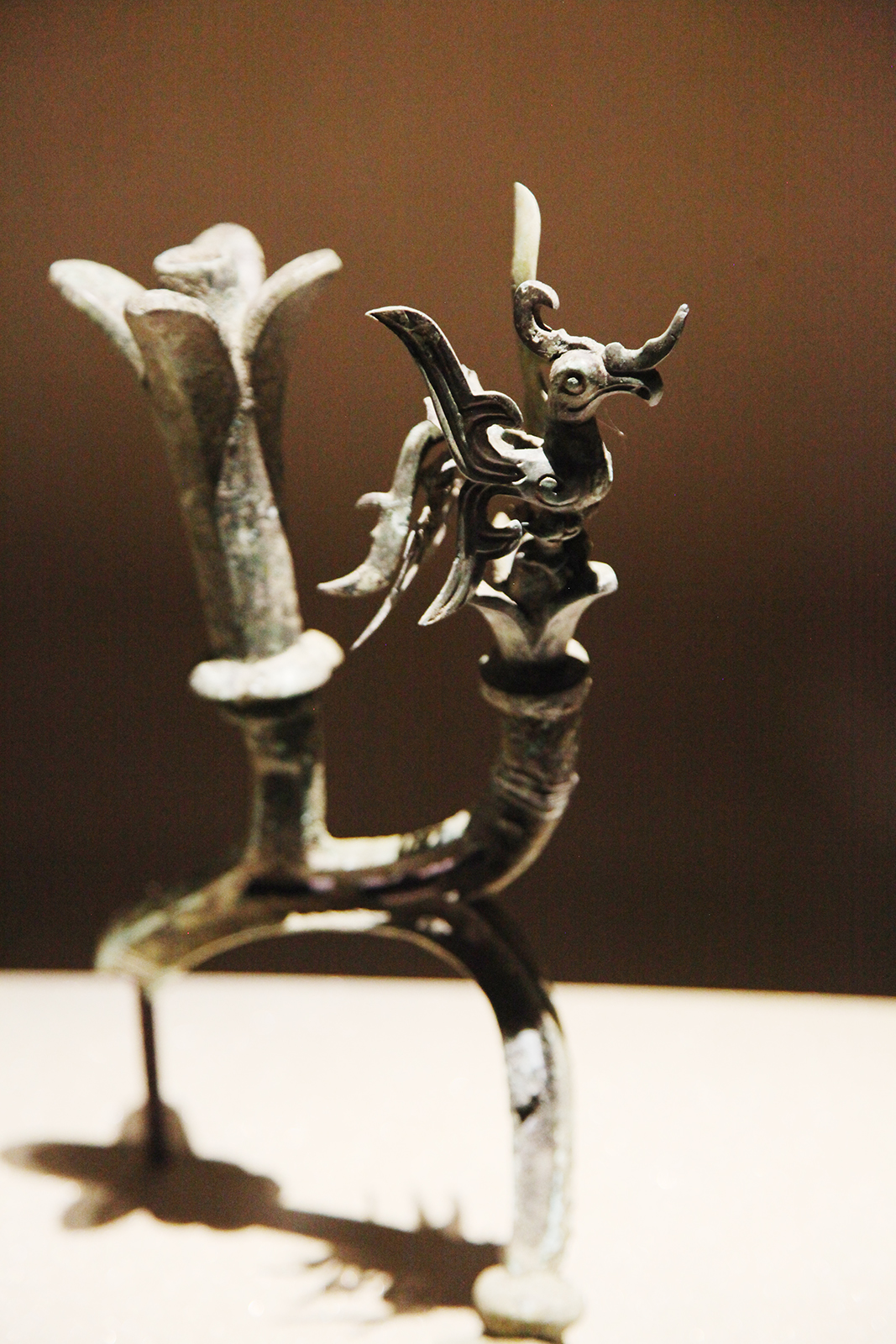 A surviving part of a bronze tree unearthed from the Sanxingdui Ruins is seen on display at the Sanxingdui Museum in Sichuan Province. /CGTN