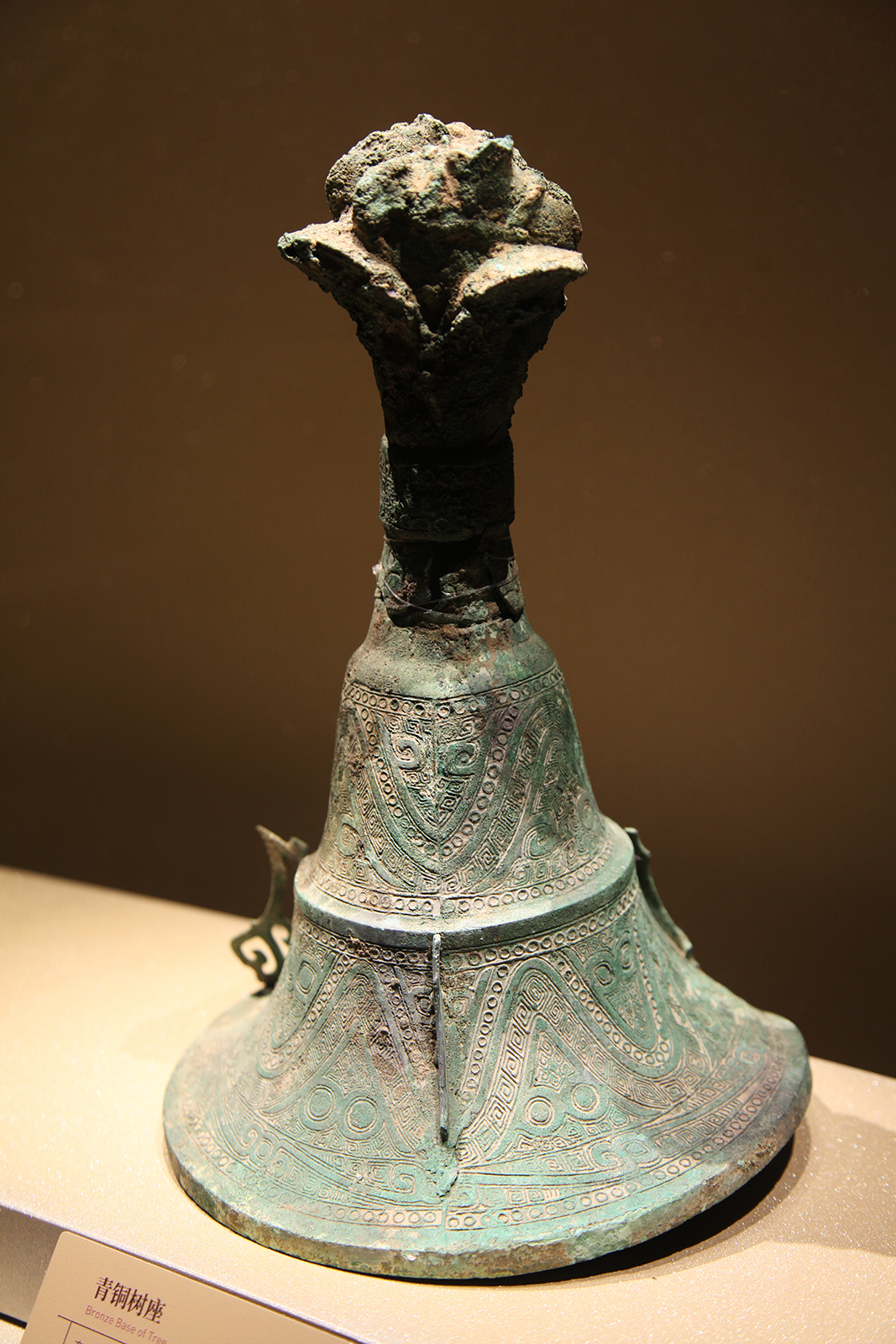 A surviving part of a bronze tree unearthed from the Sanxingdui Ruins is seen on display at the Sanxingdui Museum in Sichuan Province. /CGTN