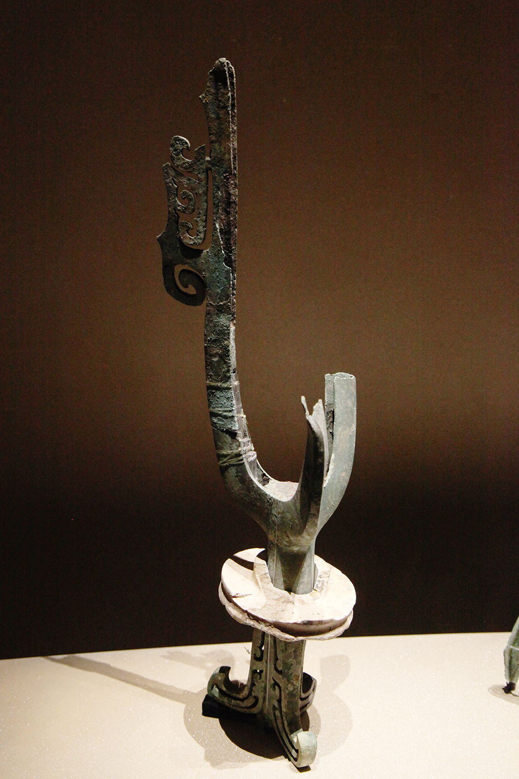 A surviving part of a bronze tree unearthed from the Sanxingdui Ruins is seen on display at the Sanxingdui Museum in Sichuan Province. /CGTN