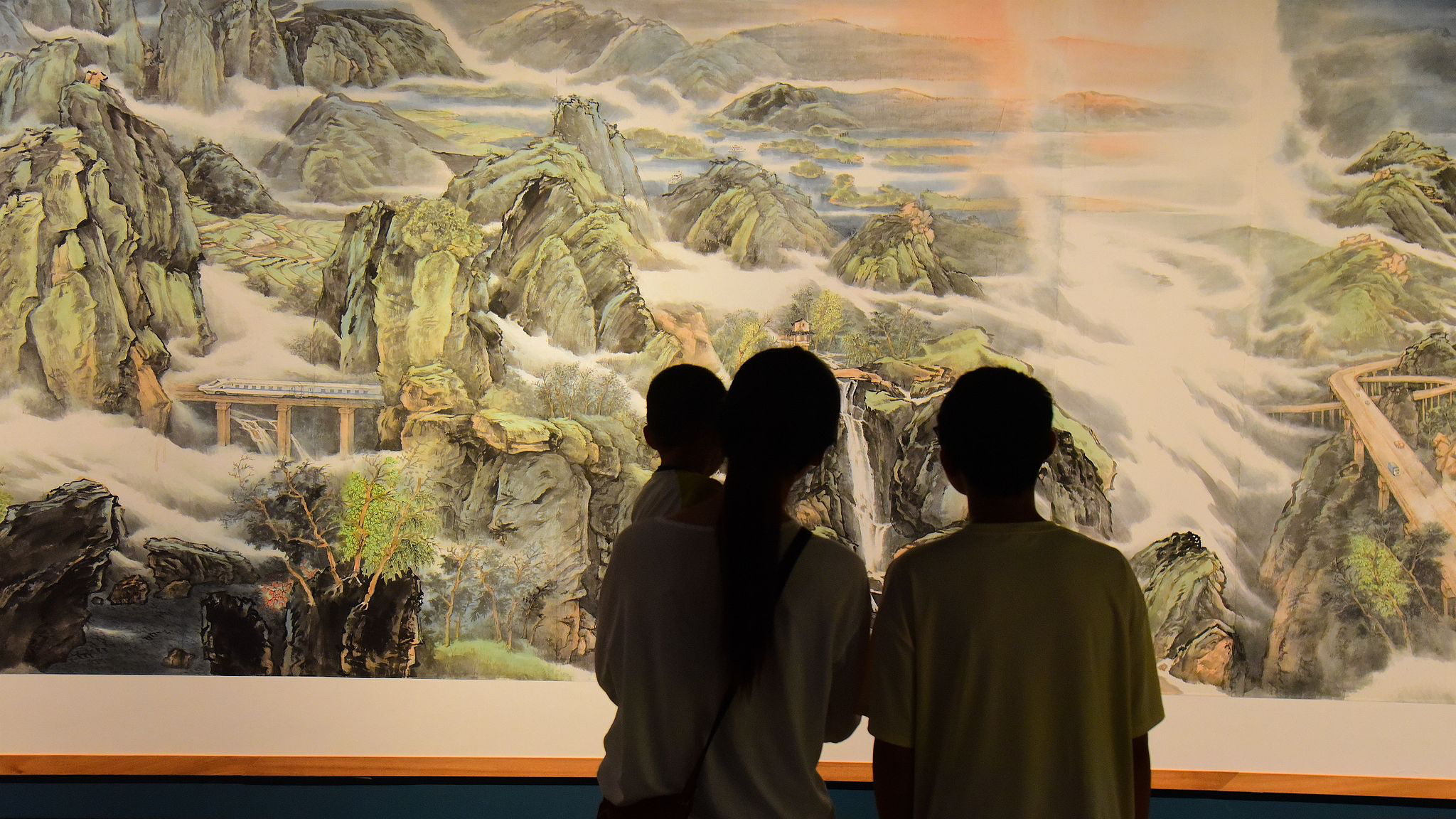 Visitors view the art work exhibition of 