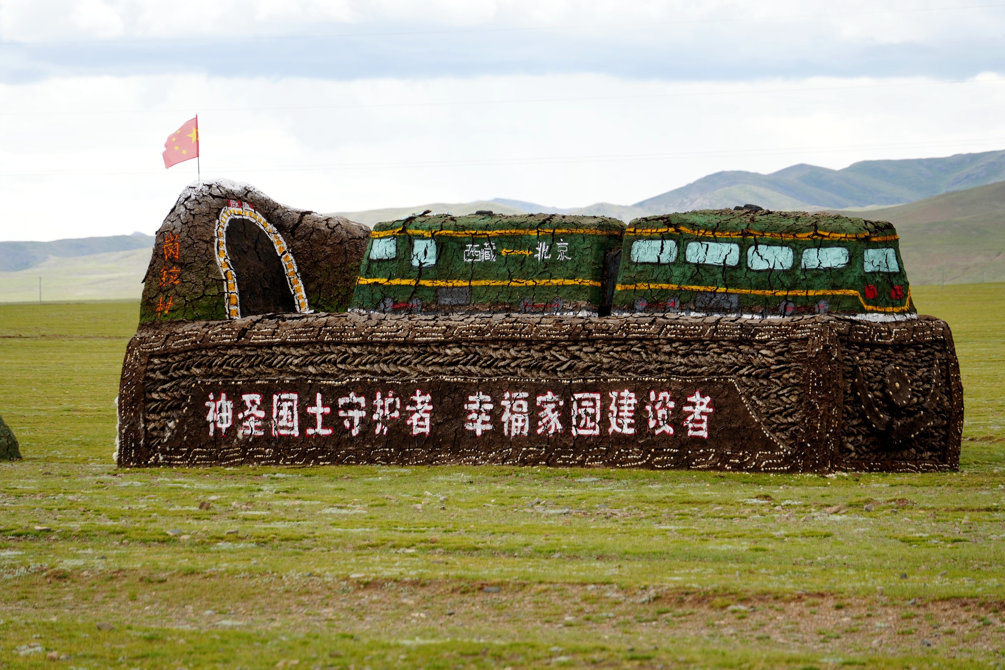 A photo shows sculptures made from yak dung, adorned with colorful paintings, created by local herders in Nagqu, Xizang Autonomous Region, August 14, 2025. /By Luo Caiwen and Huang Yue, CGTN