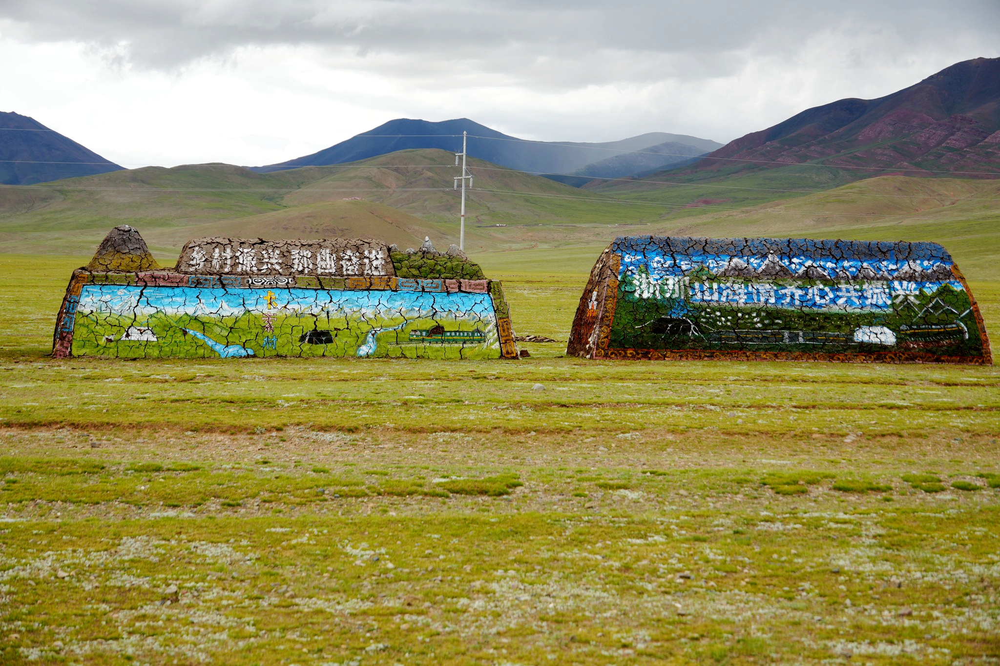 A photo shows sculptures made from yak dung, adorned with colorful paintings, created by local herders in Nagqu, Xizang Autonomous Region, August 14, 2025. /By Luo Caiwen and Huang Yue, CGTN