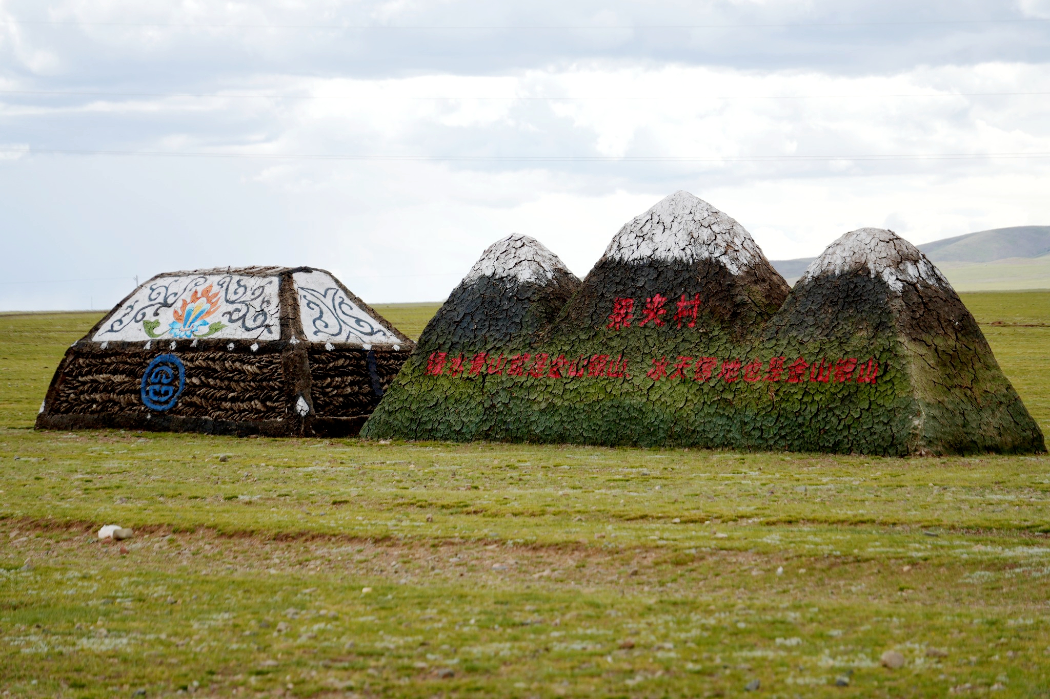 A photo shows sculptures made from yak dung, adorned with colorful paintings, created by local herders in Nagqu, Xizang Autonomous Region, August 14, 2025. /By Luo Caiwen and Huang Yue, CGTN