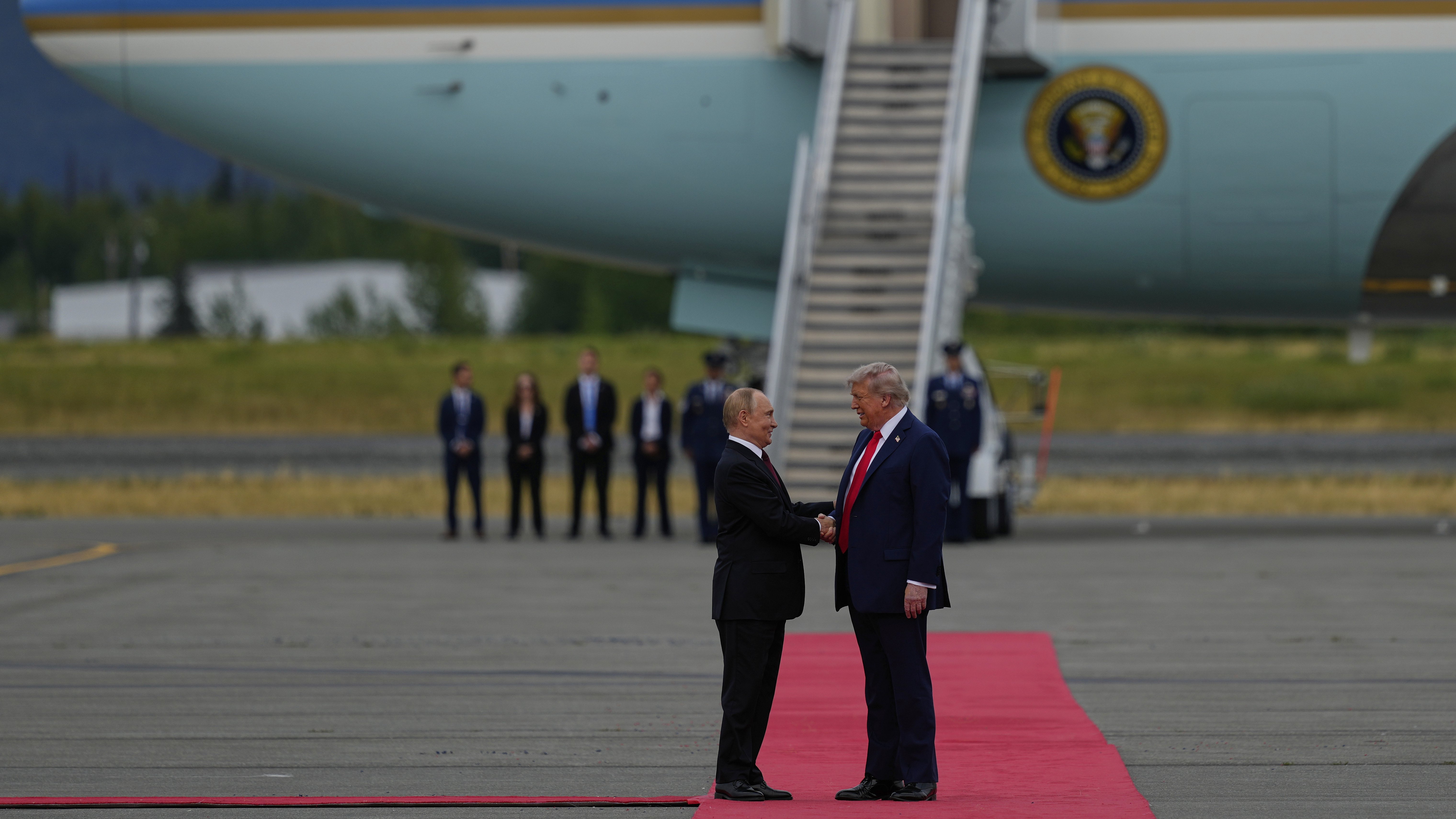 U.S. President Donald Trump greets Russian President Vladimir Putin at Joint Base Elmendorf-Richardson, Alaska, the U.S., August 15, 2025. /AP