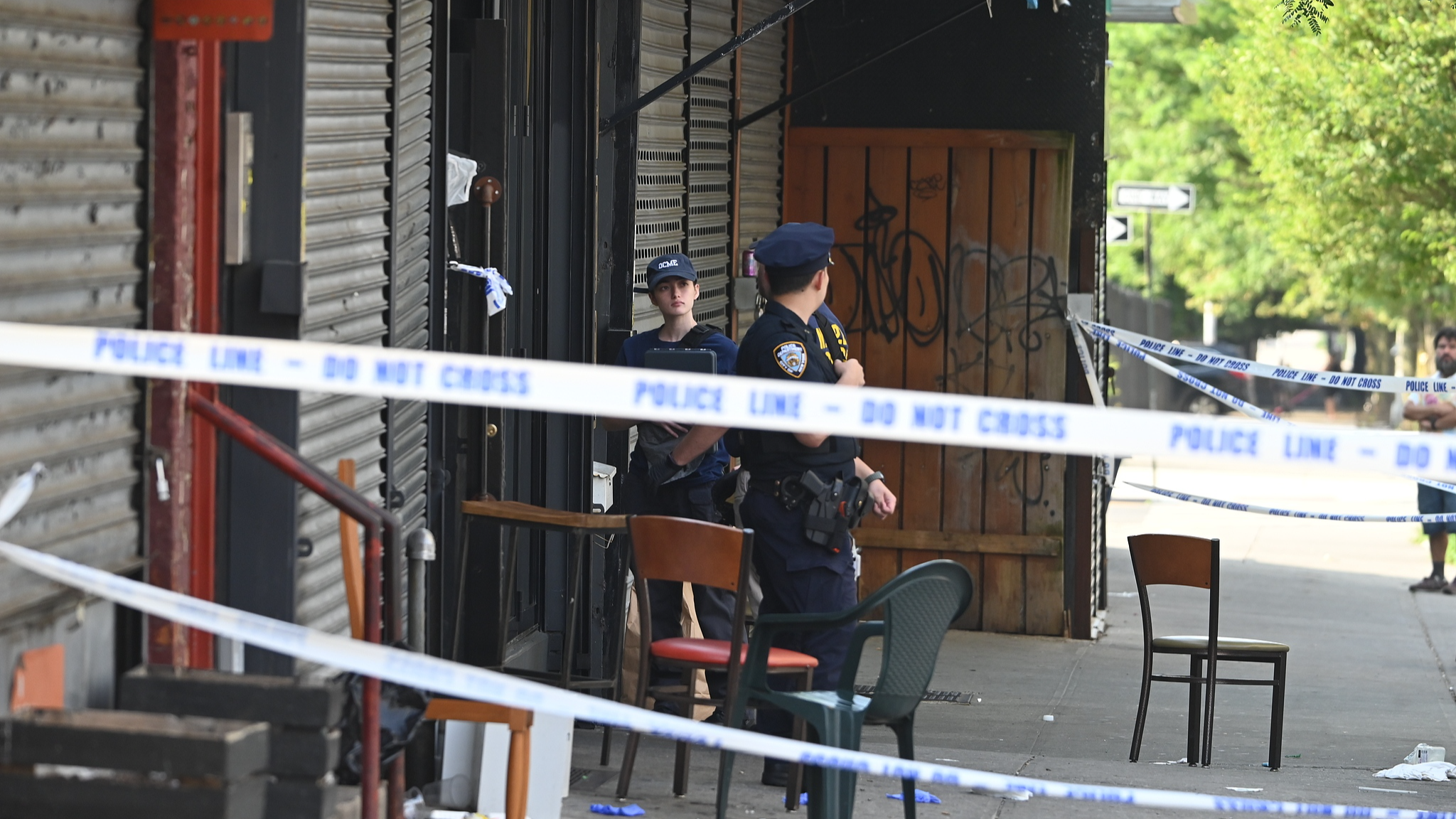 Members of the New York City Office of the Chief Medical Examiner stage at the scene and collect evidence where a mass shooting took place at a club in Brooklyn, New York, United States, August 17, 2025. /VCG