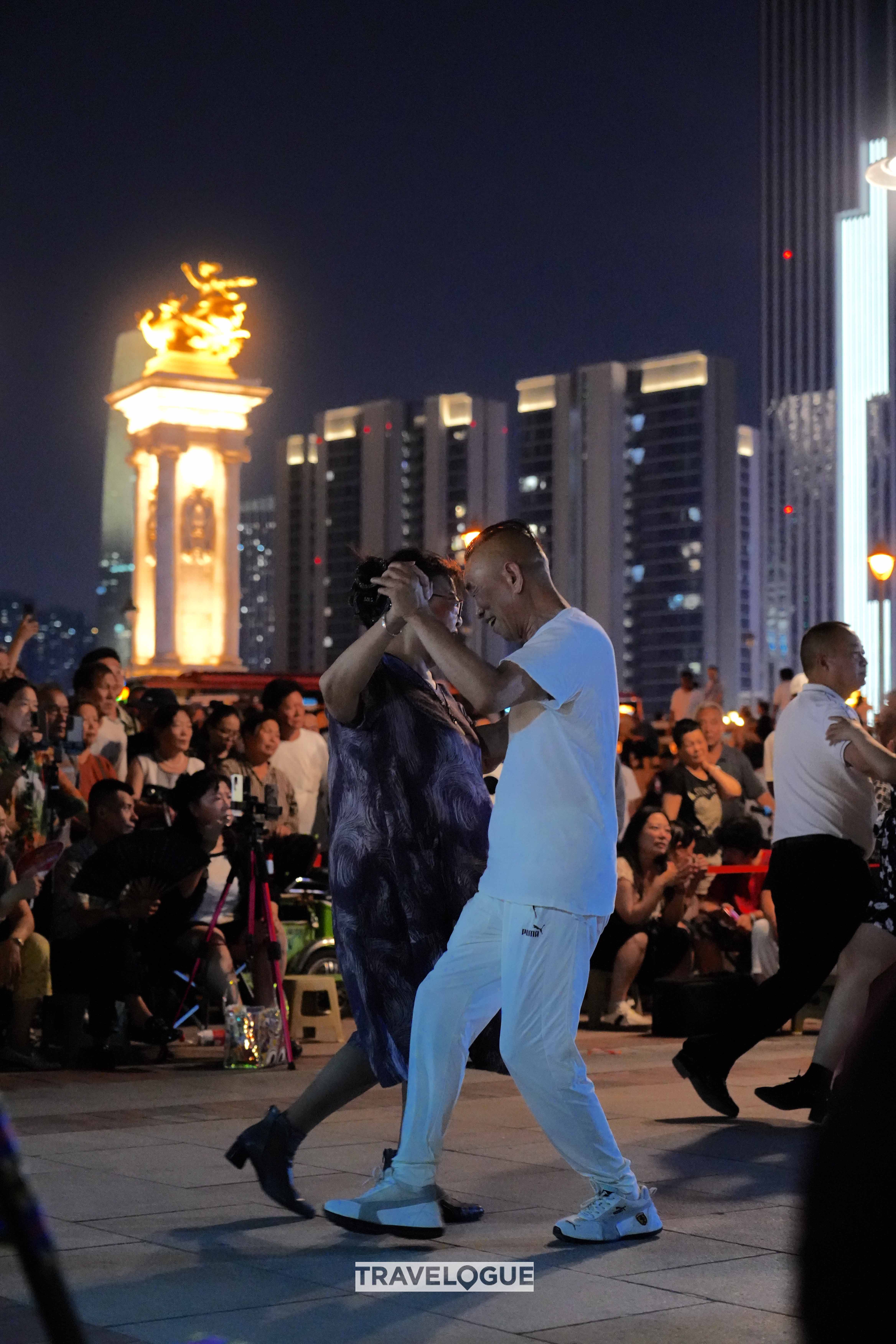 Nightlife along the illuminated Haihe River in Tianjin is vibrant. /CGTN