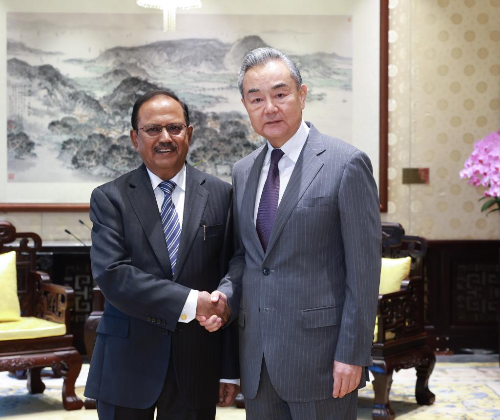 Chinese Foreign Minister Wang Yi (right) meets with Ajit Doval, India's national security adviser and special representative for the India-China boundary question, in Beijing, capital of China, June 23, 2025. /Xinhua