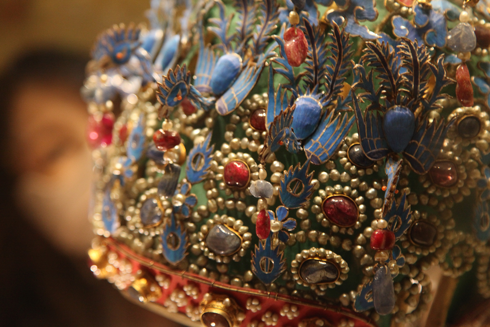 This photo shows some of the finer details of the Phoenix Coronet for Empress Xiaoduan on display at the National Museum of China in Beijing. /CGTN