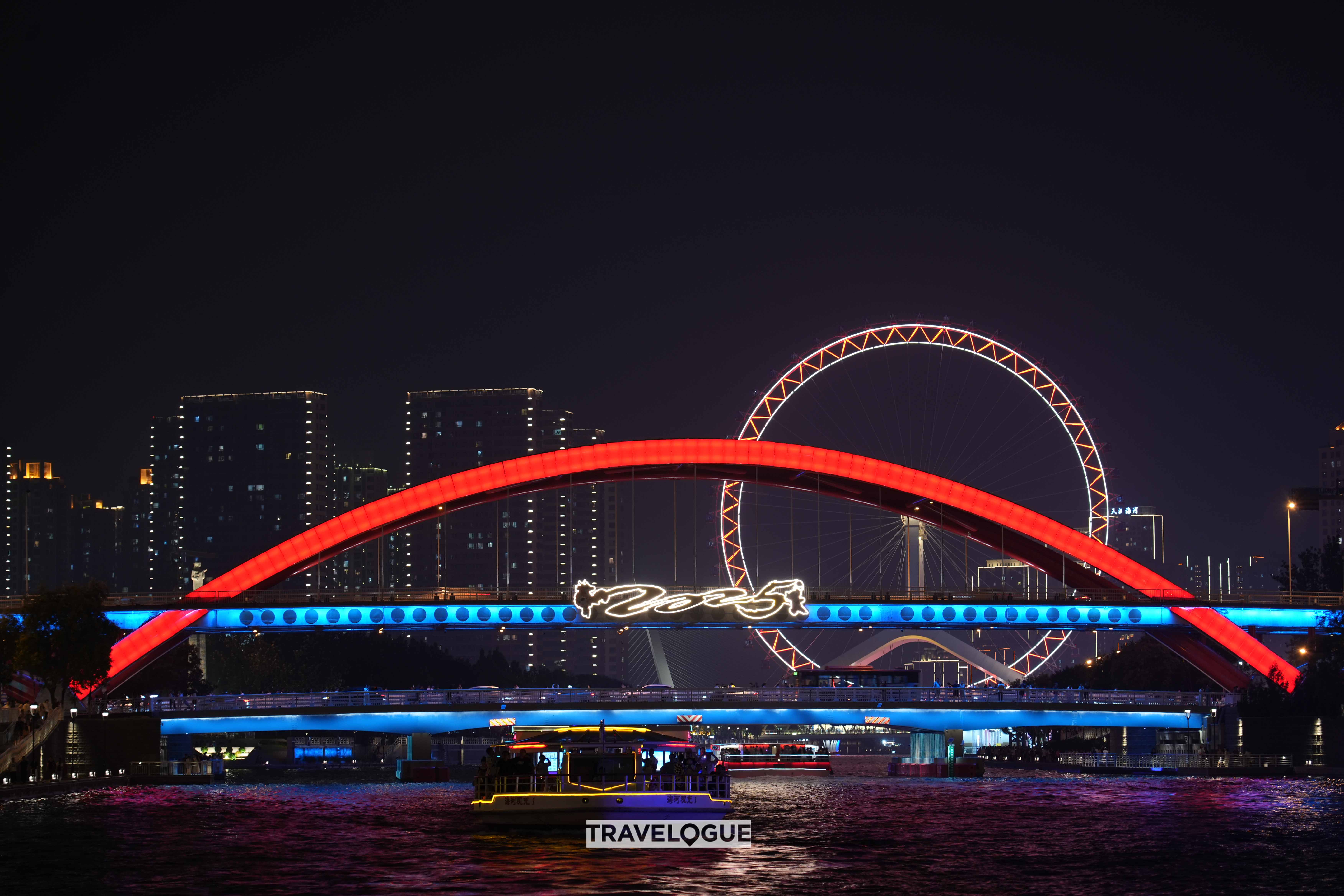 Experience Tianjin's enchanting nightscape on a Haihe River cruise. /CGTN