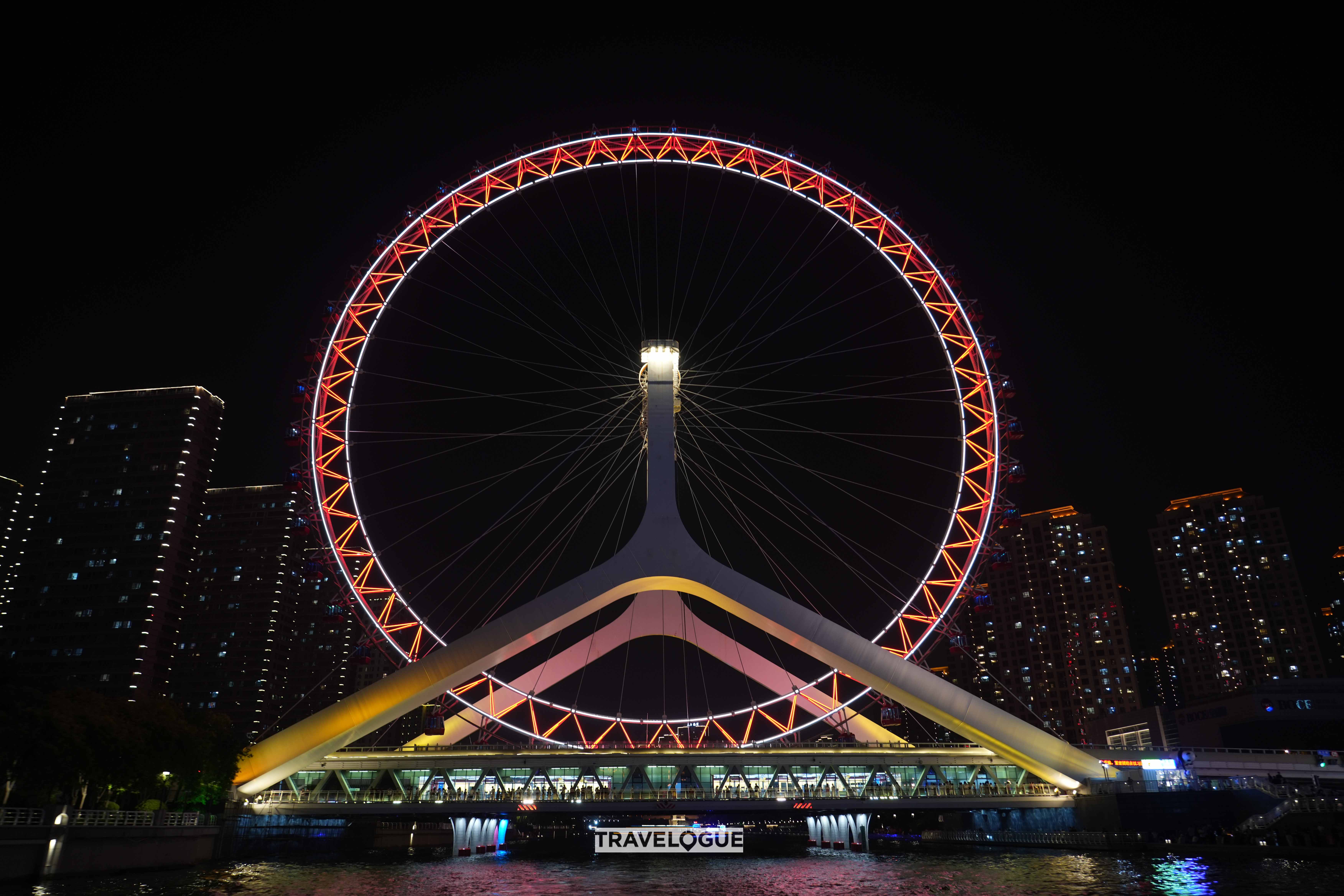 Experience Tianjin's enchanting nightscape on a Haihe River cruise. /CGTN