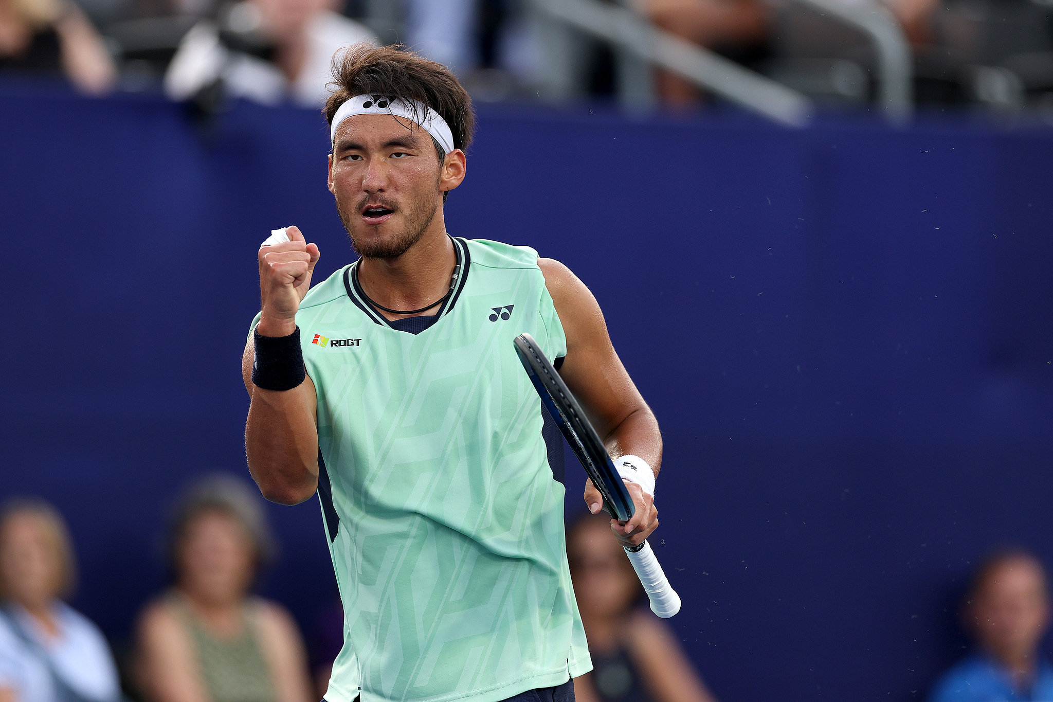 Buyunchaokete of China reacts after scoring a point against Mariano Navone of Argentina in a men's singles third round match at the Winston-Salem Open in Winston-Salem, North Carolina, August 20, 2025. /VCG