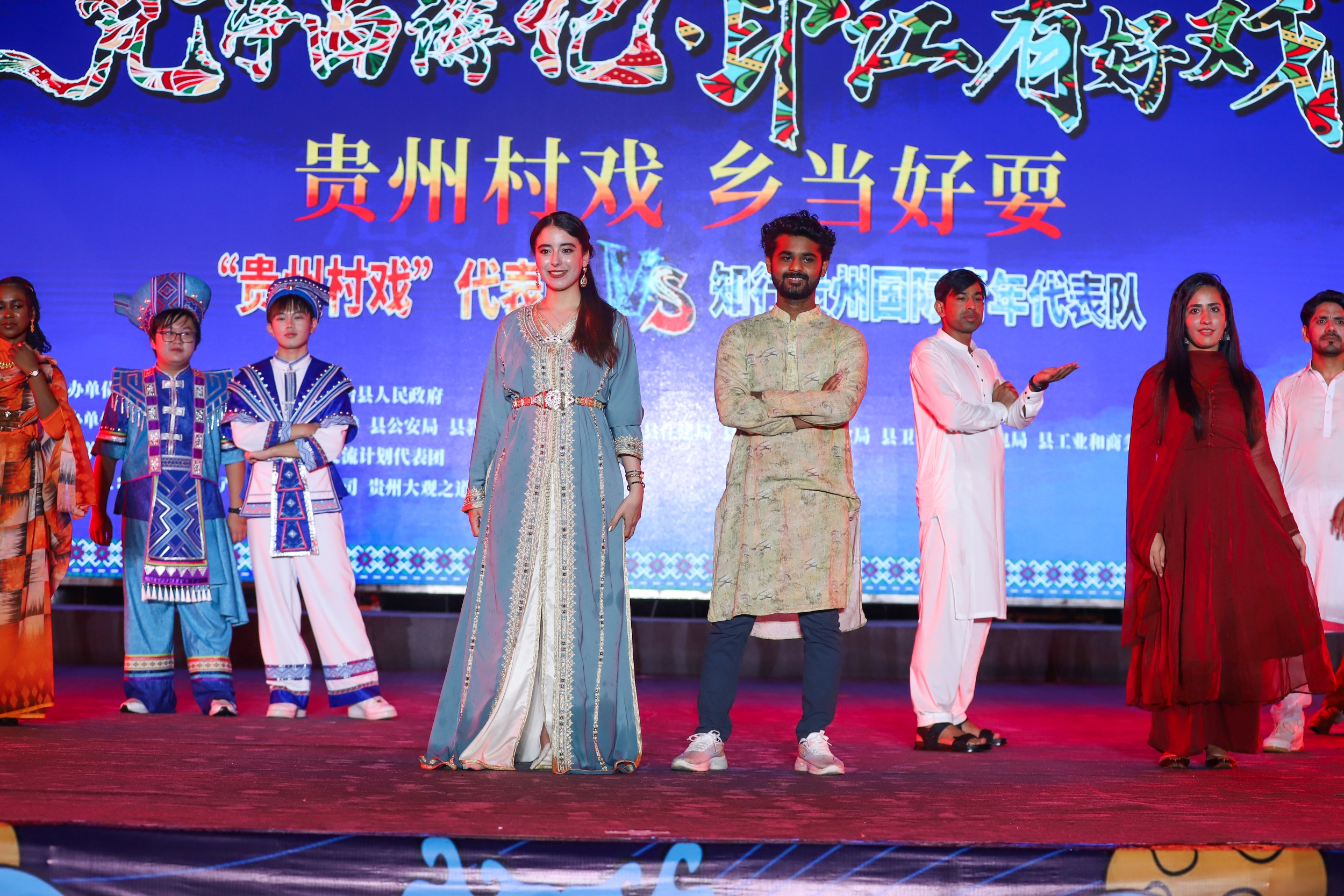 International youth participate in a Guizhou Village Opera performance in Tongren, southwest China's Guizhou Province on August 20, 2025. /Photo provided to CGTN