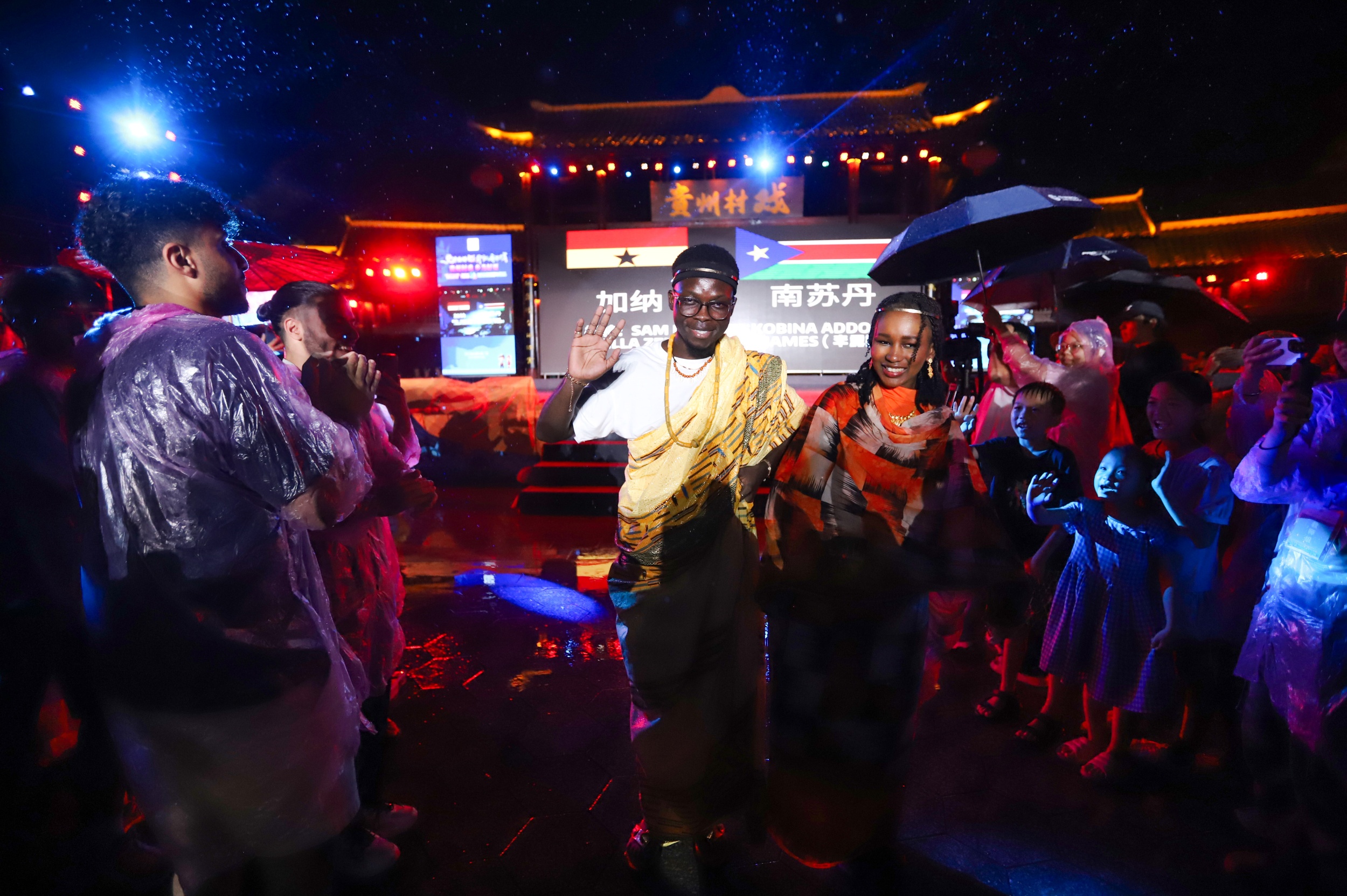 International youth participate in a Guizhou Village Opera performance in Tongren, southwest China's Guizhou Province on August 20, 2025. /Photo provided to CGTN