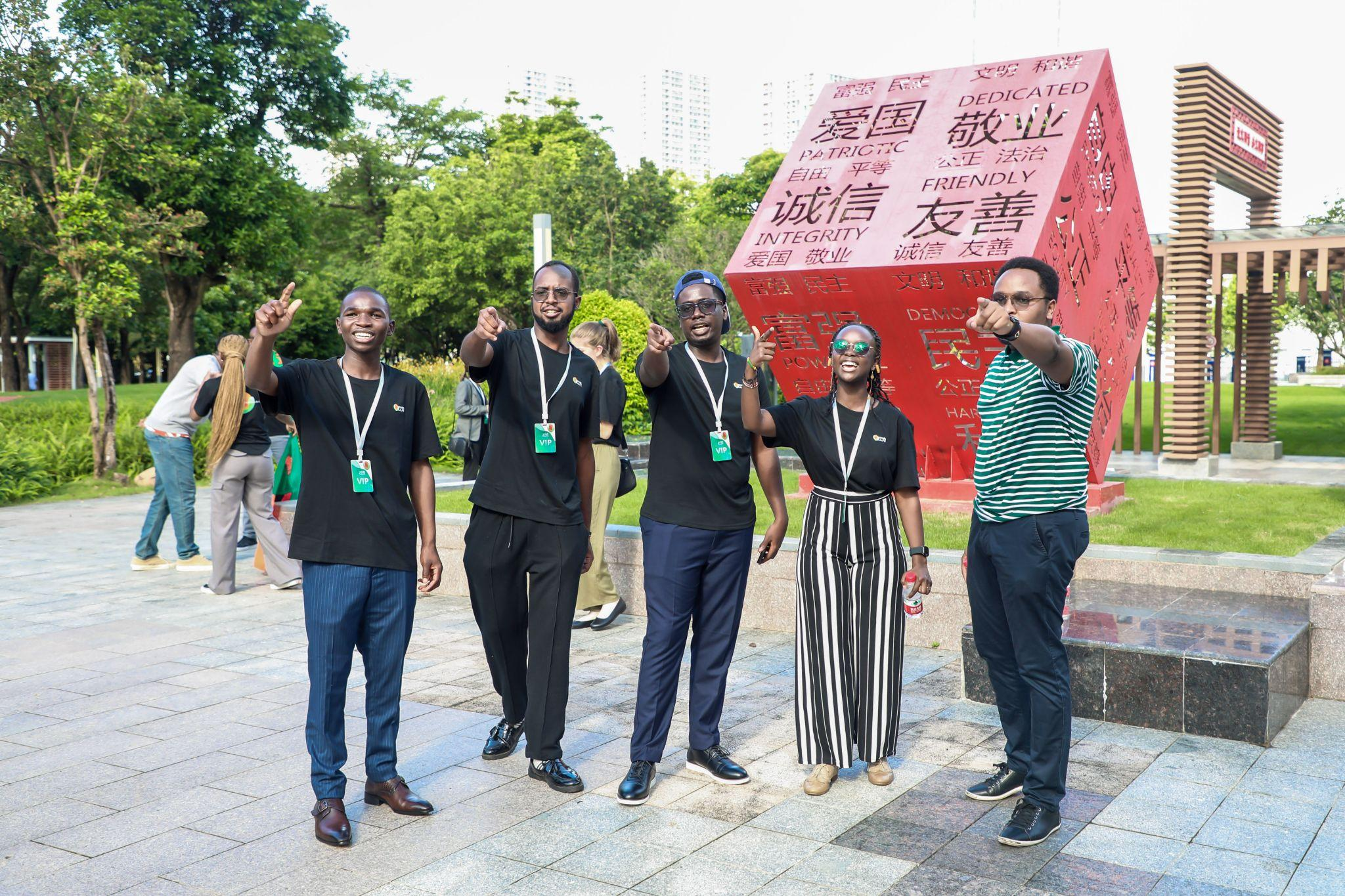 Danton Kipkurui and the Wise AI team pose for a photo in China. 