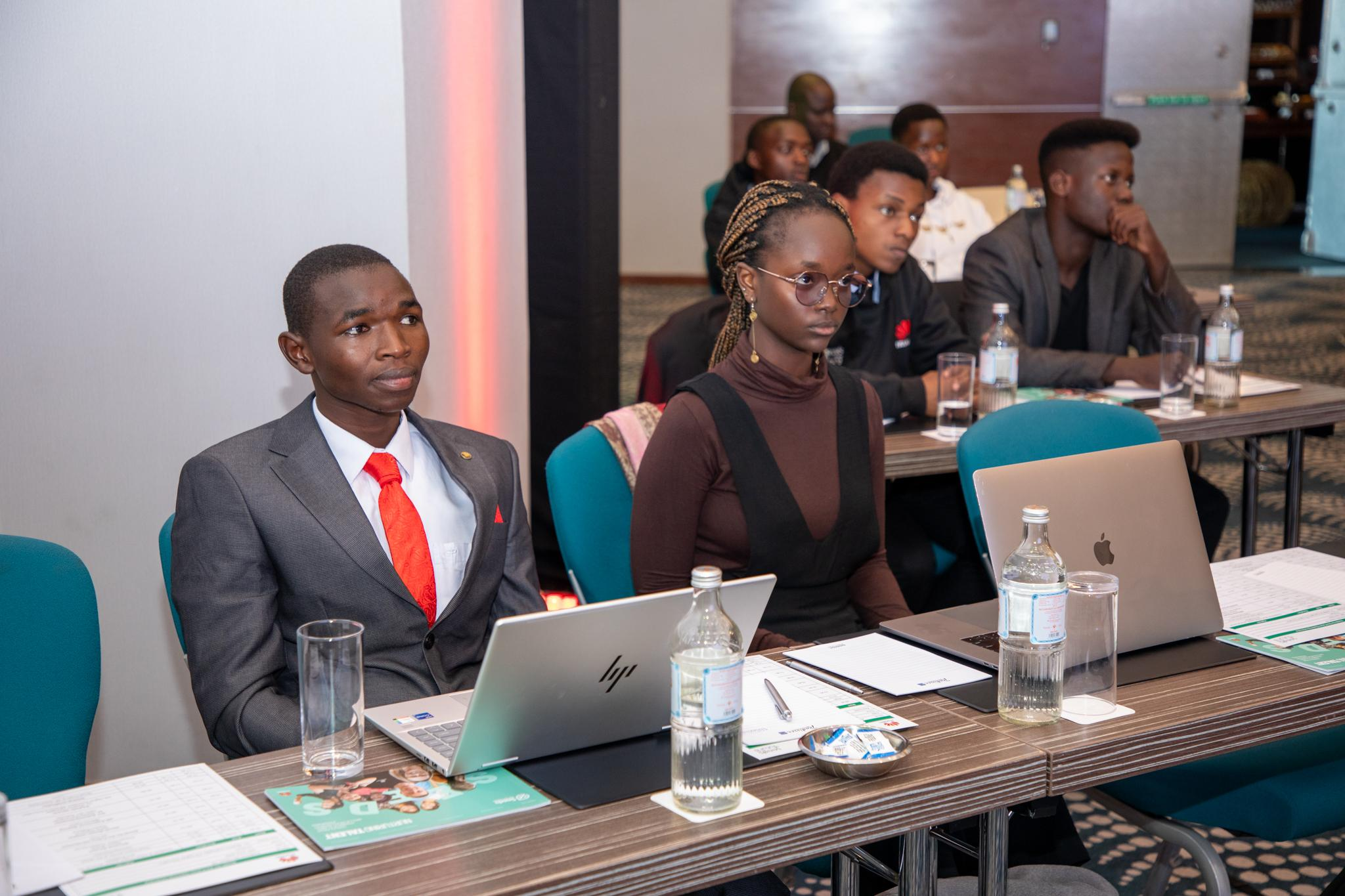 Danton Kipkurui and a Wise AI team member at 