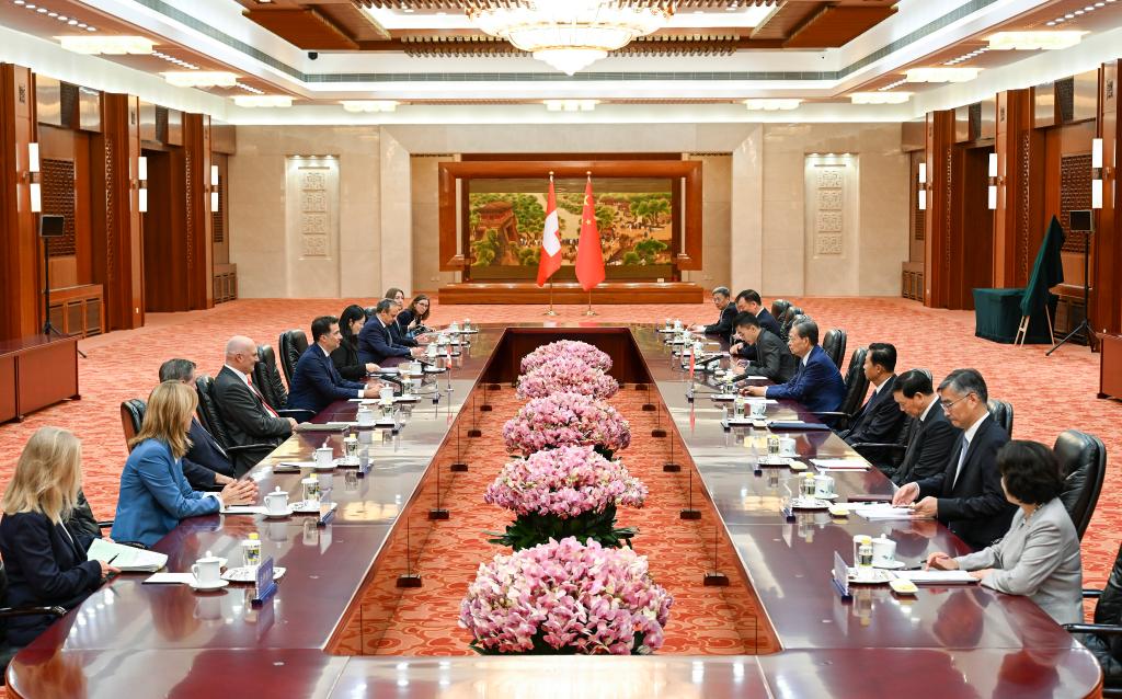 Zhao Leji, chairman of China's National People's Congress (NPC) Standing Committee, holds talks with President of the Council of States of Switzerland Andrea Caroni at the Great Hall of the People in Beijing, capital of China, August 26, 2025. /Xinhua