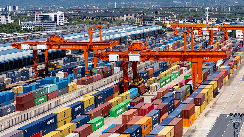 The China-Europe Railway Express is busy with container loading operations in Jinhua City, Zhejiang Province, China, August 27, 2025. /VCG
