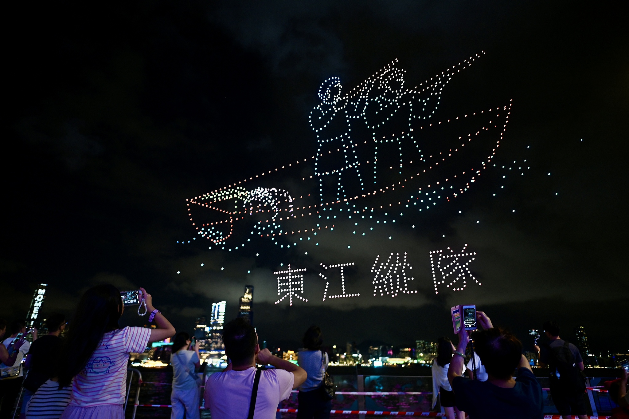 People enjoy a drone show marking the 80th anniversary of War of Resistance in Hong Kong on August 30, 2025. /VCG