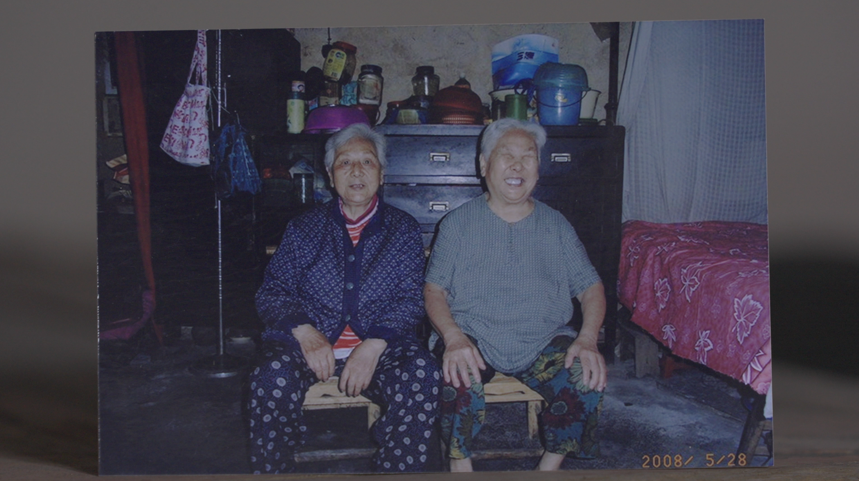 Peng Renshou (left), Peng Zhuying (right). 
Screenshot from Last Daughters. /CGTN