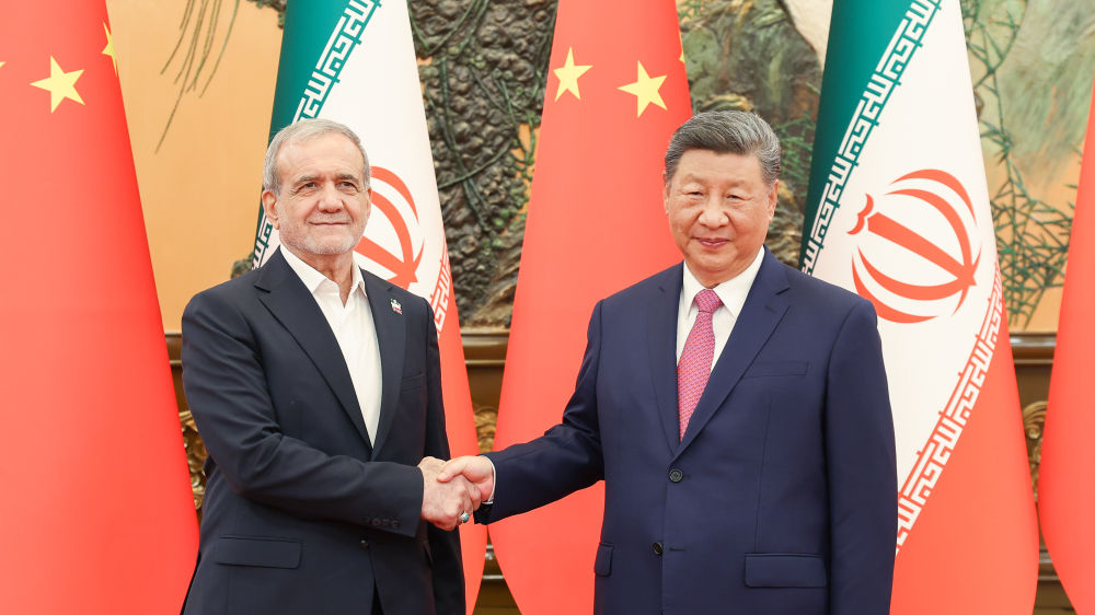 Xi says dialogue is path to lasting peace in meeting with Pezeshkian