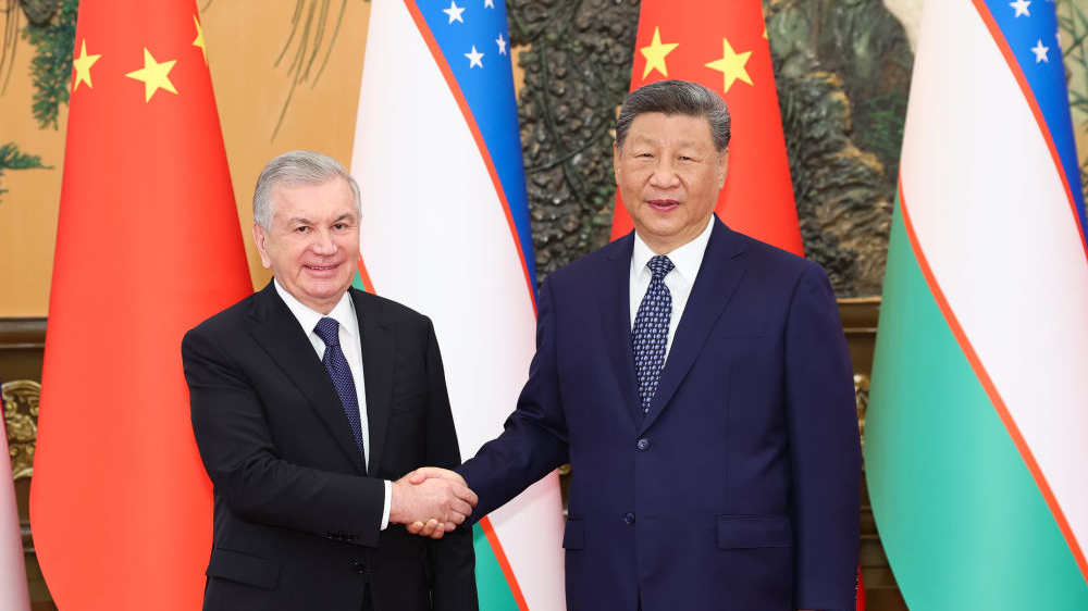 Chinese President Xi Jinping (R) meets with Uzbek President Shavkat Mirziyoyev in Beijing, China, September 2, 2025. /Xinhua