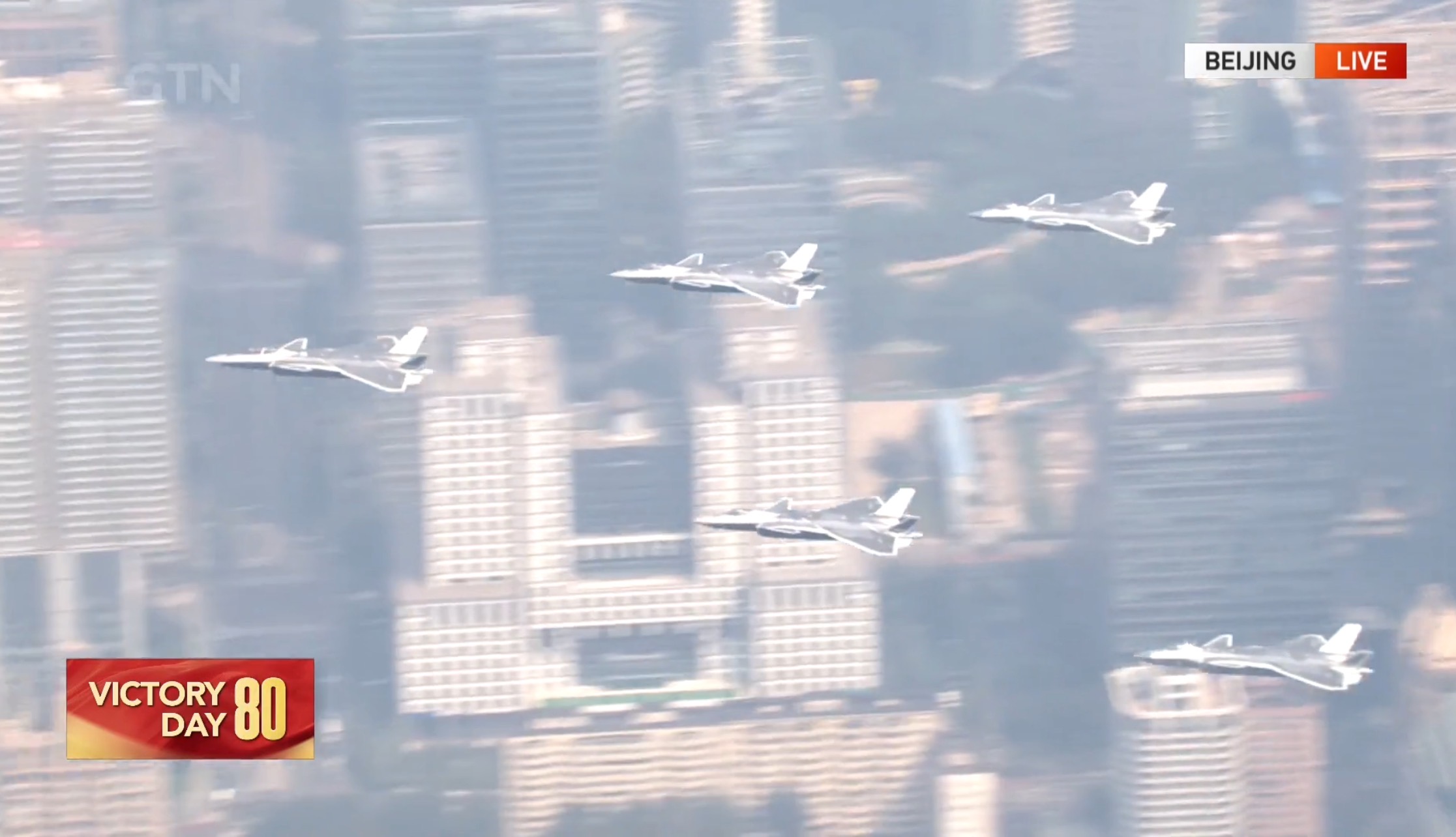 Fighters fly over Chang'an Avenue as part of V-Day parade