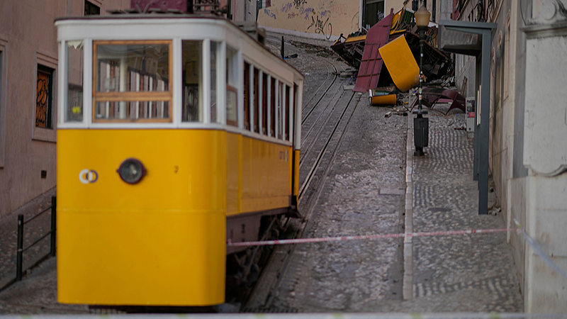 Live: Emergency crews work at funicular rail car crash site in Lisbon, Portugal