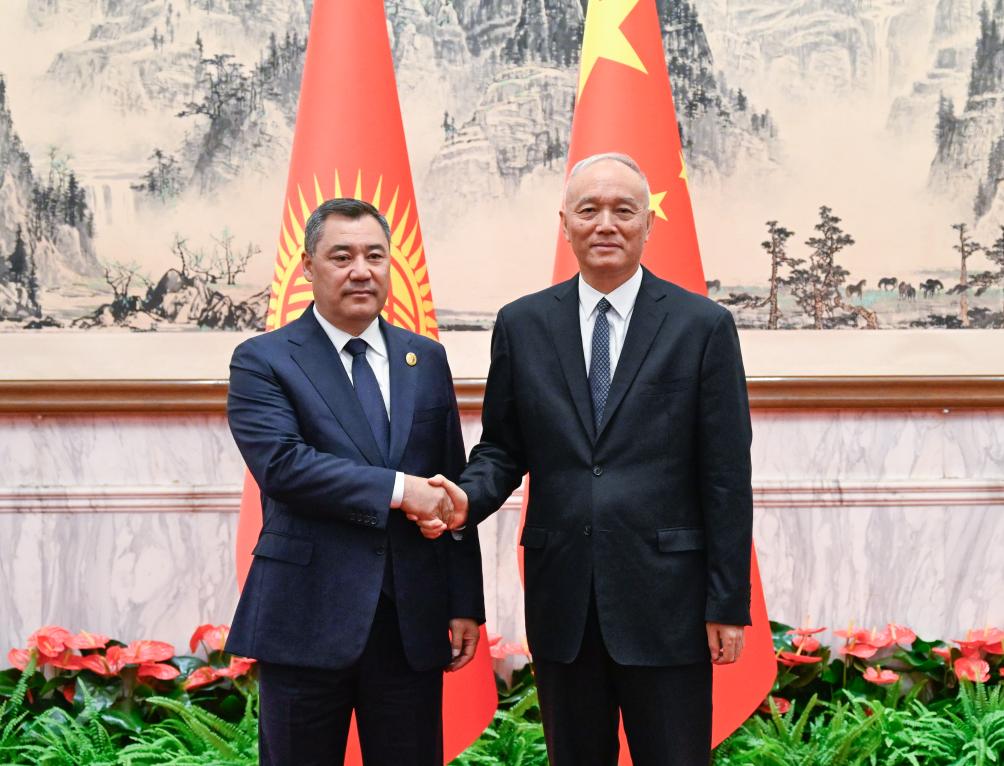 Cai Qi (R), a member of the Standing Committee of the Political Bureau of the Communist Party of China (CPC) Central Committee and a member of the Secretariat of the CPC Central Committee, meets with Kyrgyz President Sadyr Japarov in Beijing, September 3, 2025. /Xinhua