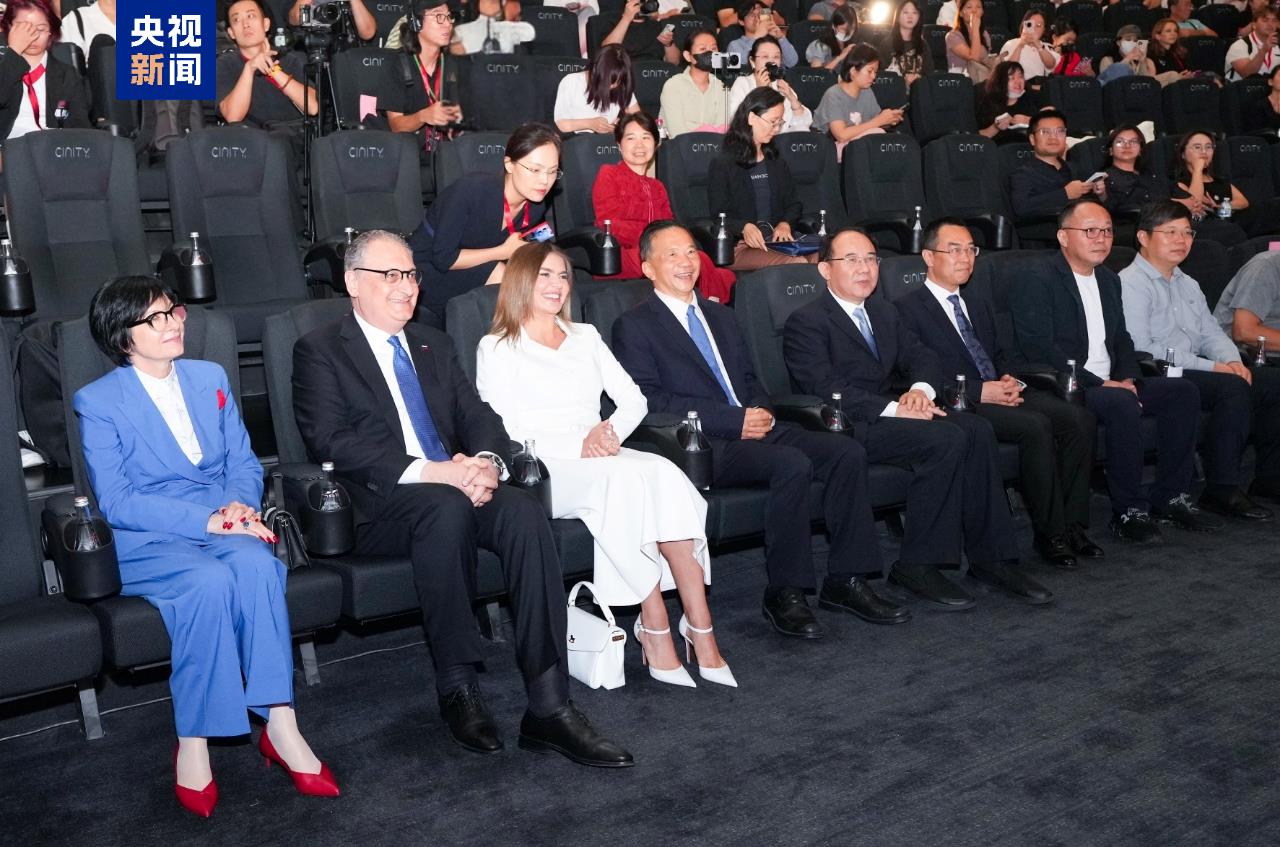 Officials attending the premiere of 
