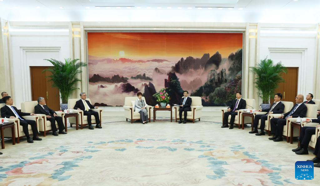 Wang Huning, a member of the Standing Committee of the Political Bureau of the Communist Party of China Central Committee and chairman of the National Committee of the Chinese People's Political Consultative Conference, meets with representatives of various sectors from Taiwan region, including former chairperson of the Chinese Kuomintang party Hung Hsiu-chu, who are in Beijing for commemorations marking the 80th anniversary of the victory of the Chinese People's War of Resistance Against Japanese Aggression and the World Anti-Fascist War on September 4, 2025. /Xinhua