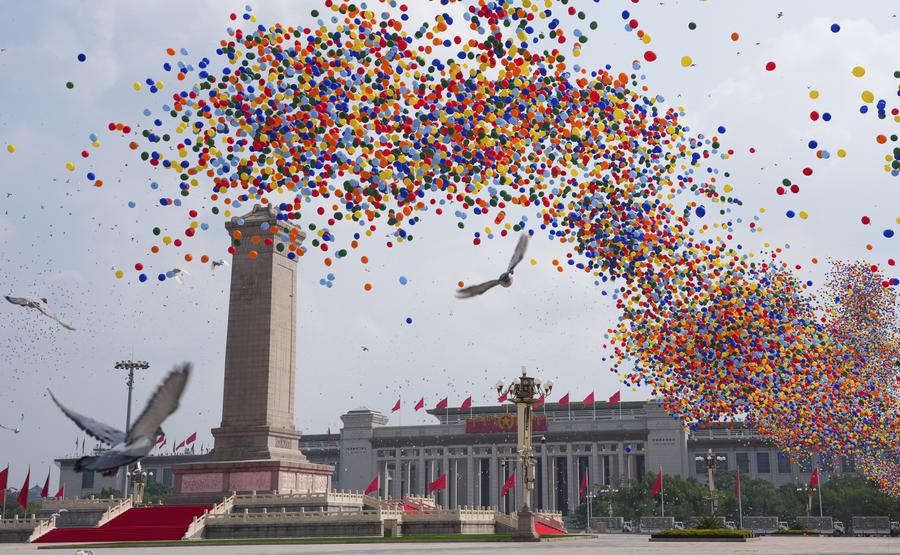 Pigeons and balloons are released into the sky over Tian'anmen Square in Beijing, capital of China, September 3, 2025. /Xinhua