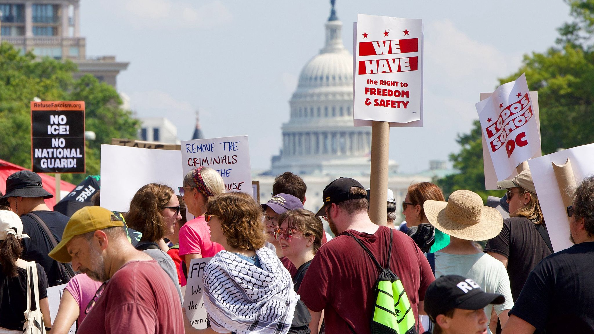 Demonstrators hold signs and called for an end to the deployment of National Guard troops in Washington, D.C., September 6, 2025. /VCG