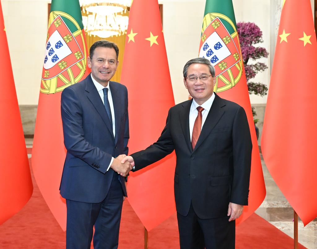 Chinese Premier Li Qiang (R) holds talks with Portuguese Prime Minister Luis Montenegro, who is in China for an official visit, at the Great Hall of the People in Beijing, capital of China, September 9, 2025. /Xinhua