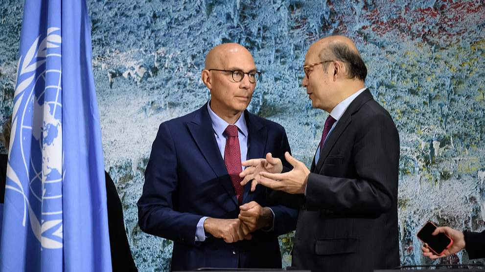 Chinese Ambassador to the UN in Geneva Chen Xu (R) speaks with UN High Commissioner for Human Rights Volker Turk at the opening of the 60th session of the United Nations Human Rights Council in Geneva, September 8, 2025. /VCG