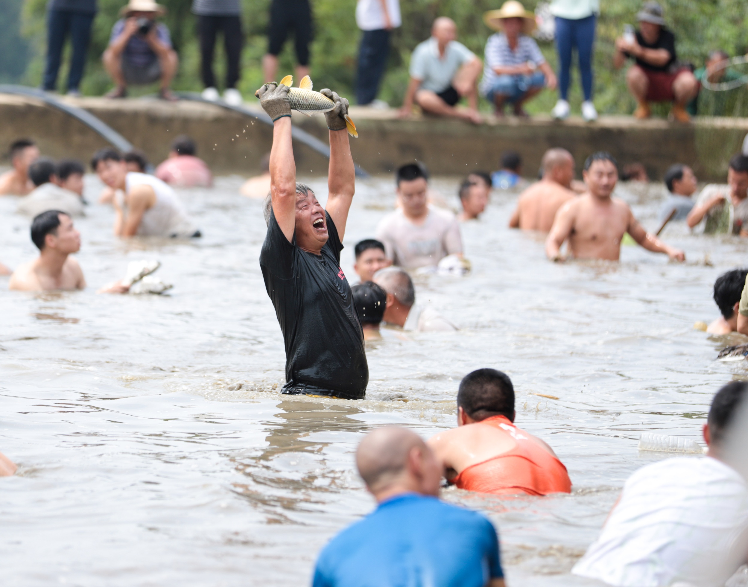 A tribute rice harvest opening ceremony is held in Guojiawan Village, Yuping Dong Autonomous County, Tongren City, southwest China's Guizhou Province on September 6, 2025. /Photo provided to CGTN