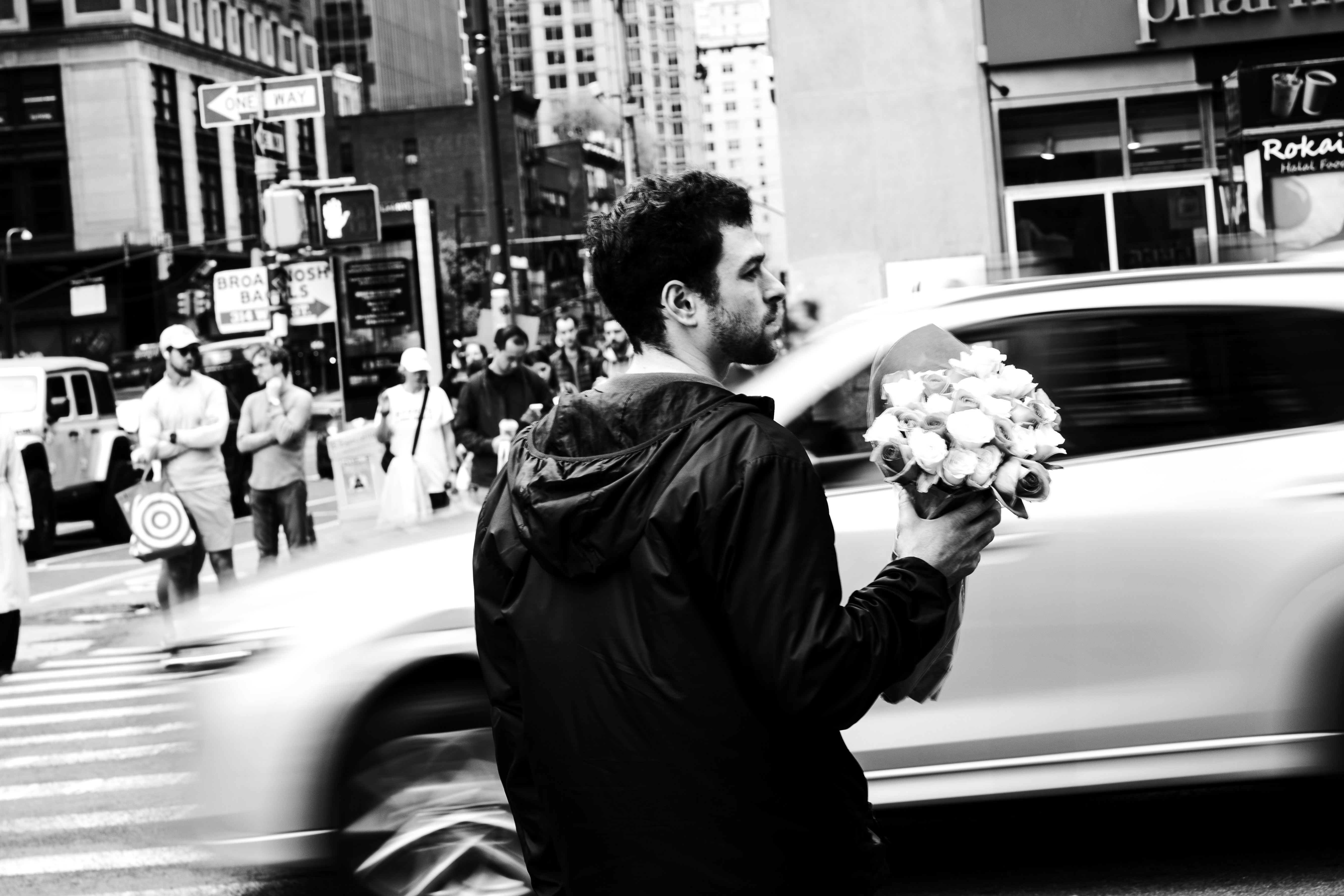 Everybody Gets to Be Somebody Here: A girl grips balloons like armor. A boy fights summer with a hydrant. A bouquet waits for someone who may never come. Mike Merino's camera doesn't chase headlines, it listens to the street. These are moments of presence, but aren't moments of power, that's everything. Because equity doesn't always march. Sometimes it flirts. Dances. Leans. Laughs. Or just stands there. This city doesn't speak one language. It hums, snaps, flinches, explodes, pauses. And Mike captures all of it. No hierarchy. No permission needed. /Mike Merino