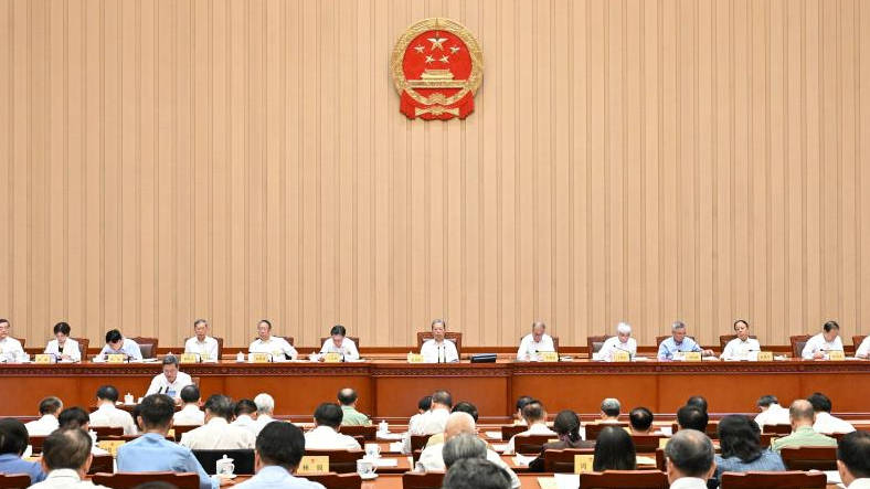 Chinese lawmakers hear reports at NPC standing committee session