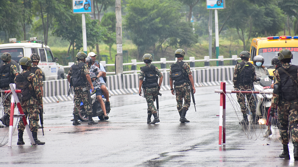 Army personnel inspect civilians and patrol the streets, after protesters set fire to the parliament and other government buildings in protests, Kathmandu, Nepal, September 10, 2025. /CFP