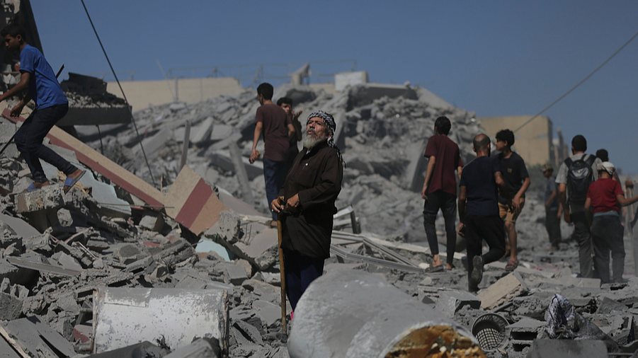 Palestinians inspect the rubble of a building after an Israeli military strike in Gaza City, September 12, 2025. /VCG
