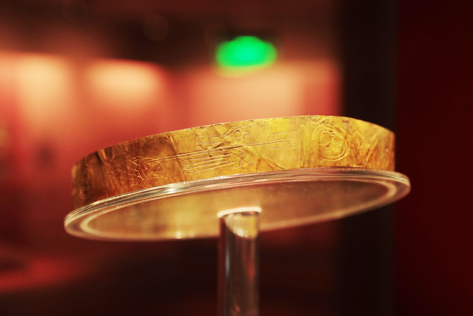 The Gold Crown Belt with four groups of patterns chiseled on the surface – each featuring a human head, an arrow, a bird and a fish – can be seen on display at the Jinsha Site Museum in Chengdu, Sichuan Province. /CGTN