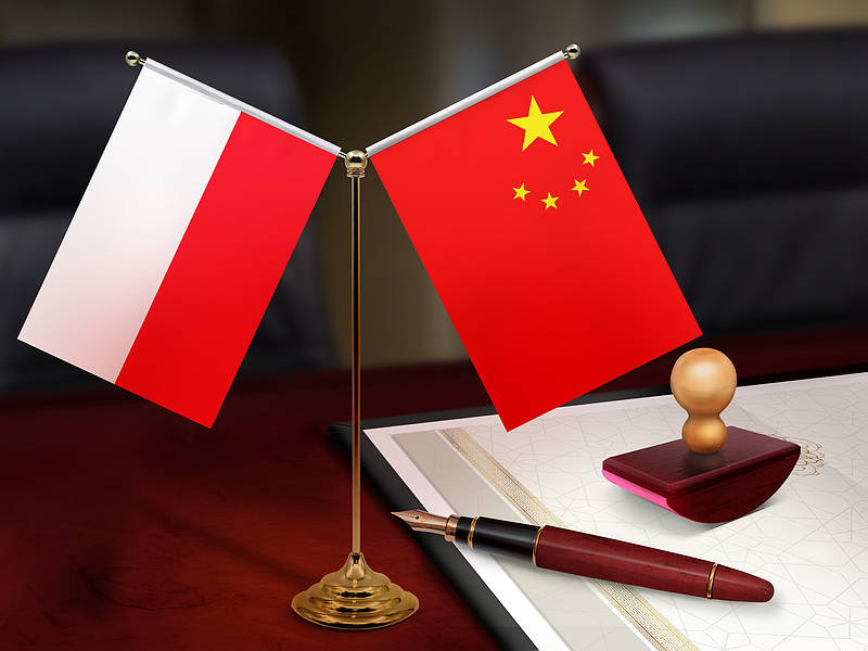 National flags of China (R) and Poland