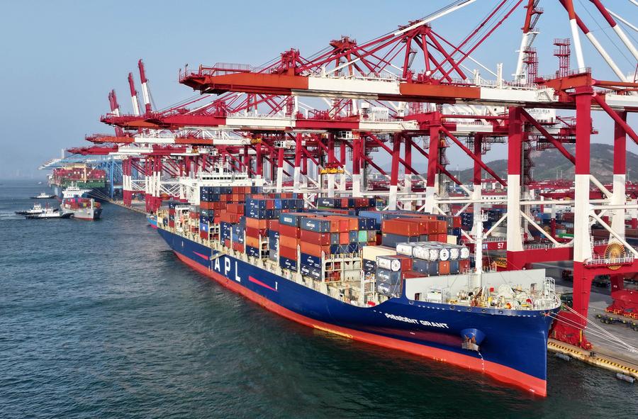 Cargo ship berths at a container dock of Qingdao Port in Qingdao, east China's Shandong Province, April 30, 2025. /Xinhua