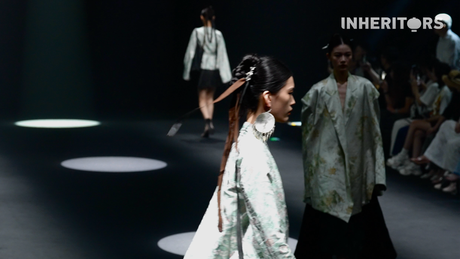 Miao embroidery, reimagined with AI and big data, blends traditional stitching with silver ornaments to create designs that are both timeless and new. /CGTN