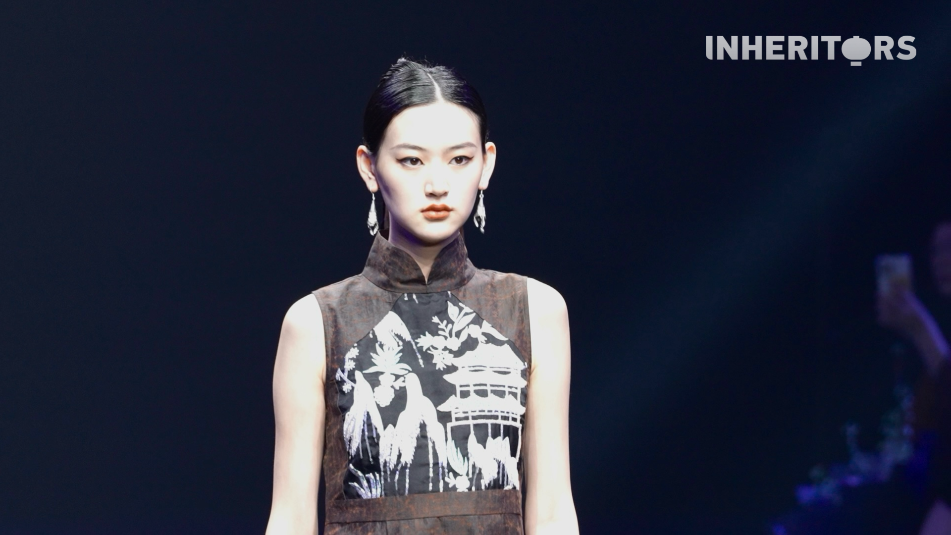 Miao embroidery, reimagined with AI and big data, blends traditional stitching with silver ornaments to create designs that are both timeless and new. /CGTN