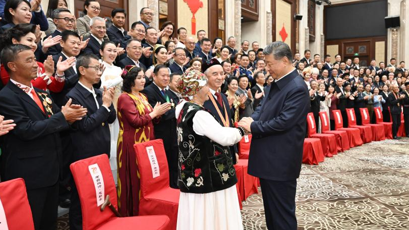 Chinese President Xi Jinping, also general secretary of the Communist Party of China Central Committee and chairman of the Central Military Commission, meets with representatives from all ethnic groups and all walks of life in northwest China's Xinjiang Uygur Autonomous Region, in Urumqi, the regional capital, September 23, 2025. /Xinhua
