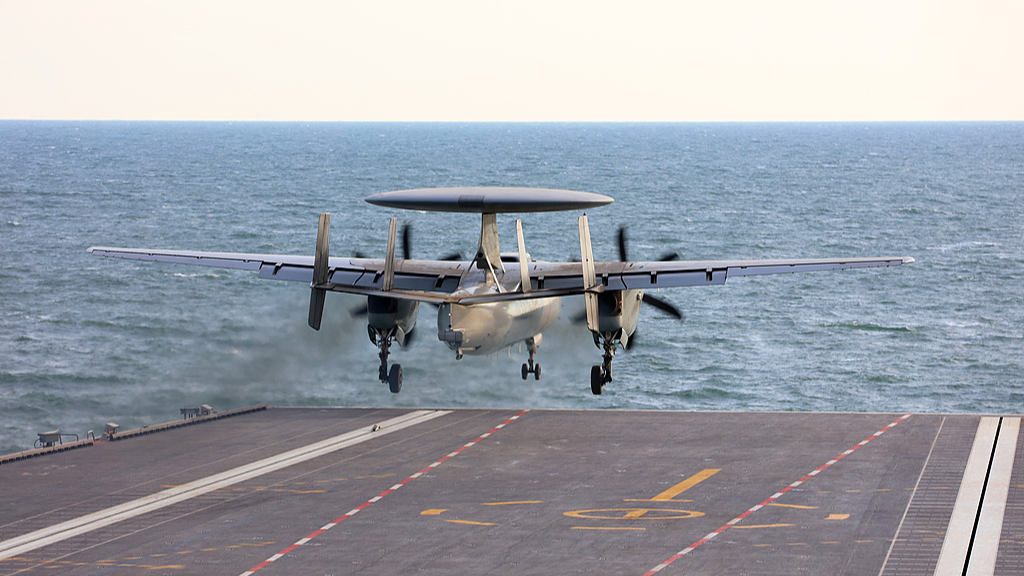 A carrier-based aircraft KongJing-600 makes an electromagnetic catapult-assisted takeoff on China's Fujian aircraft carrier. /VCG