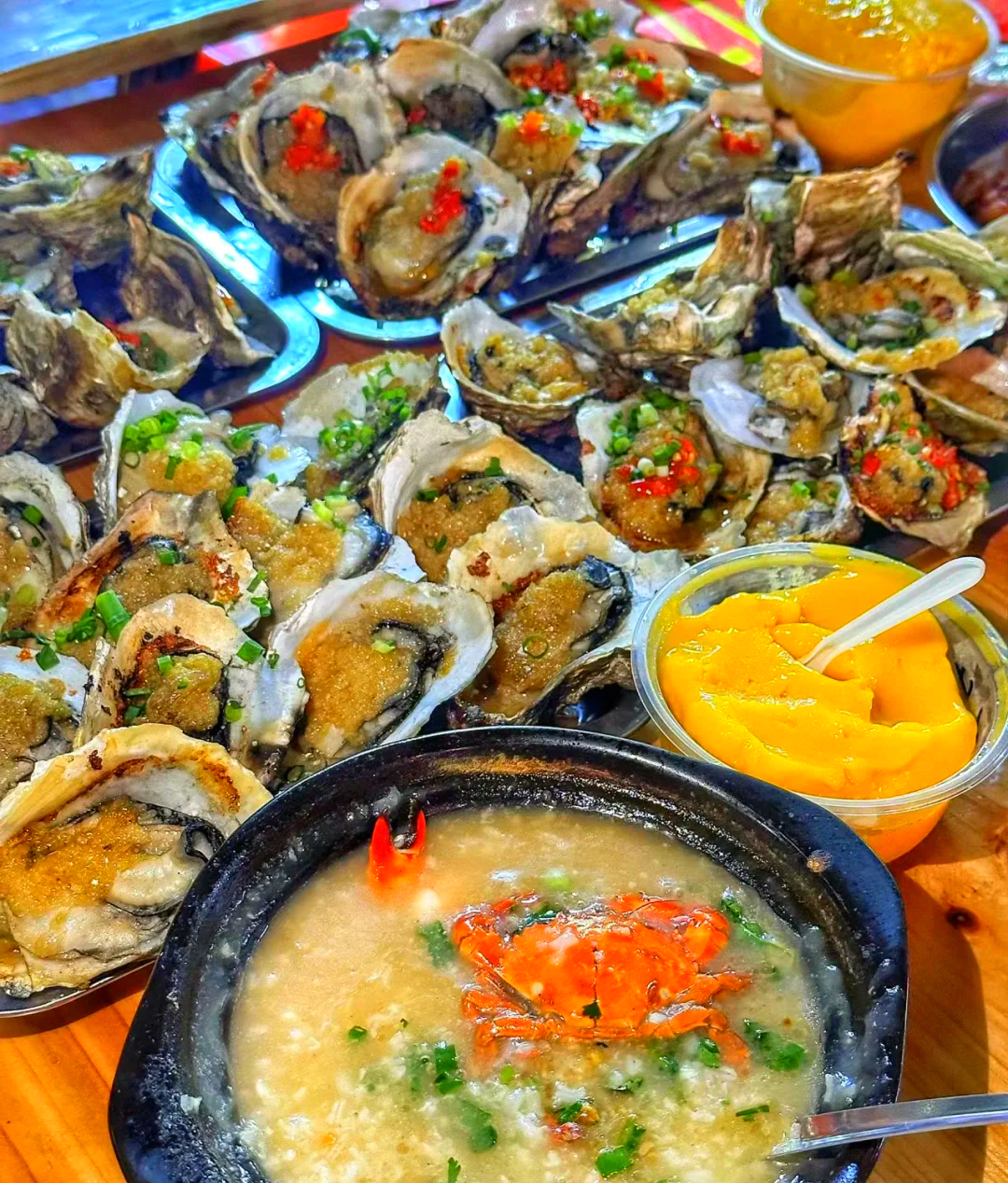 A variety of street delicacies are on offer at Xincun Night Market in Lingshui, Hainan Province. /Photo provided to CGTN